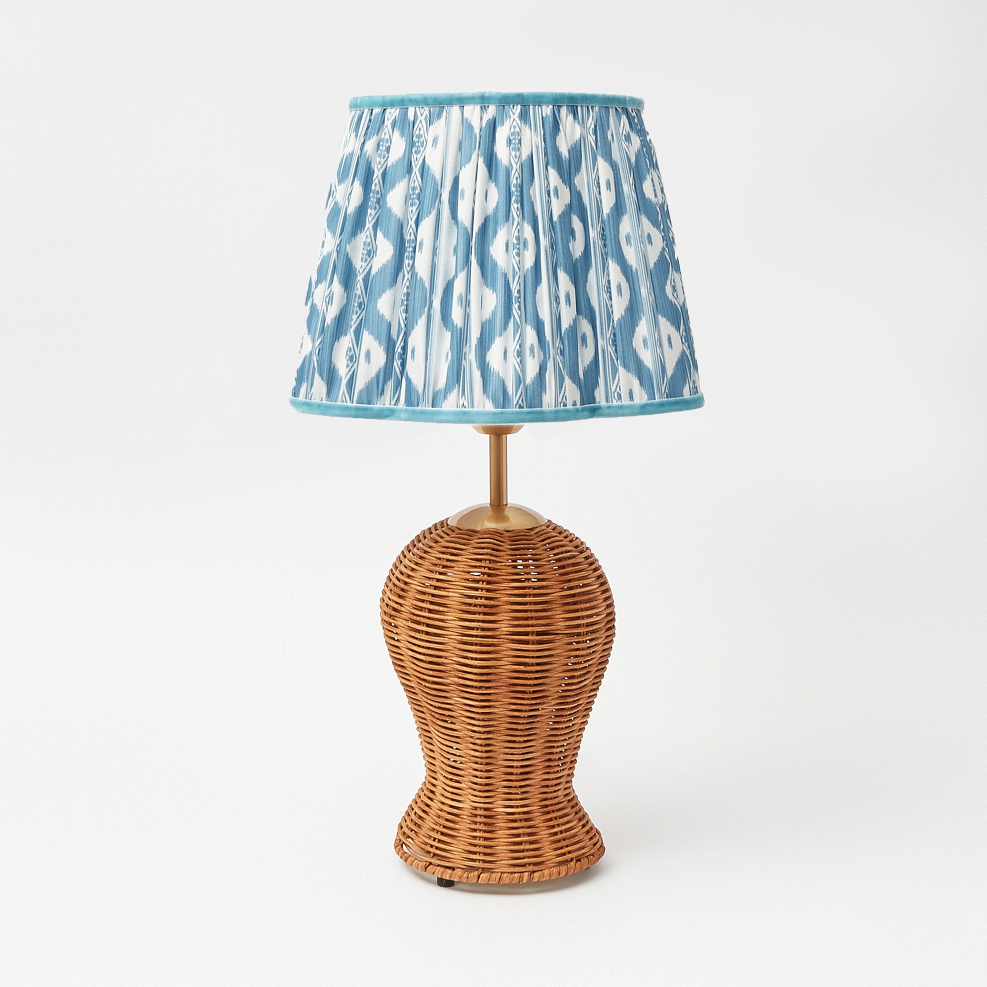 White wicker store table lamp