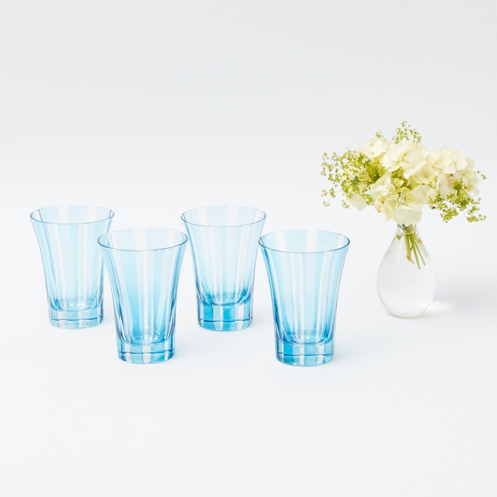 http://www.mrsalice.com/cdn/shop/files/blue-positano-glasses-set-of-4-mrs-alice-1_70bf3520-bada-47ed-bcd3-a9ee345d2bad.jpg?v=1689359810