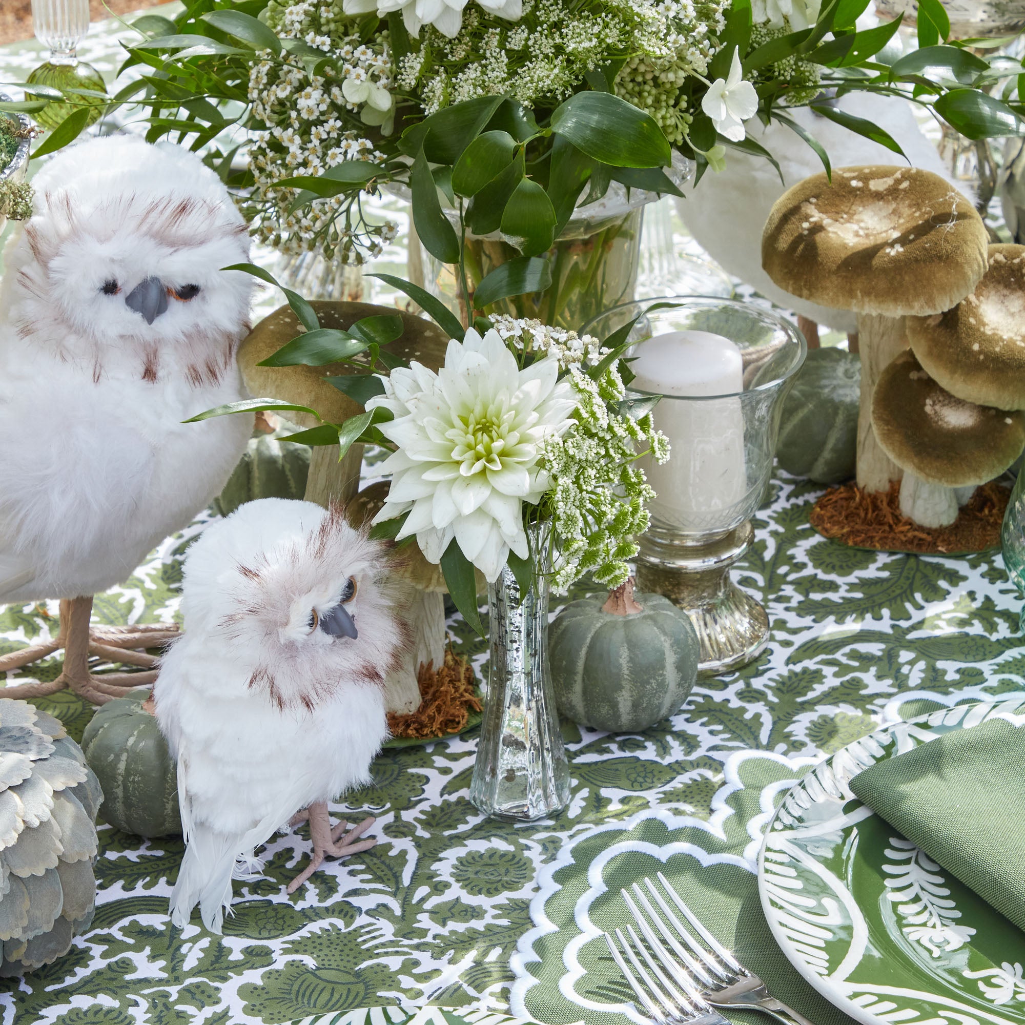 Embrace charm with this Snowy Owl Pair.