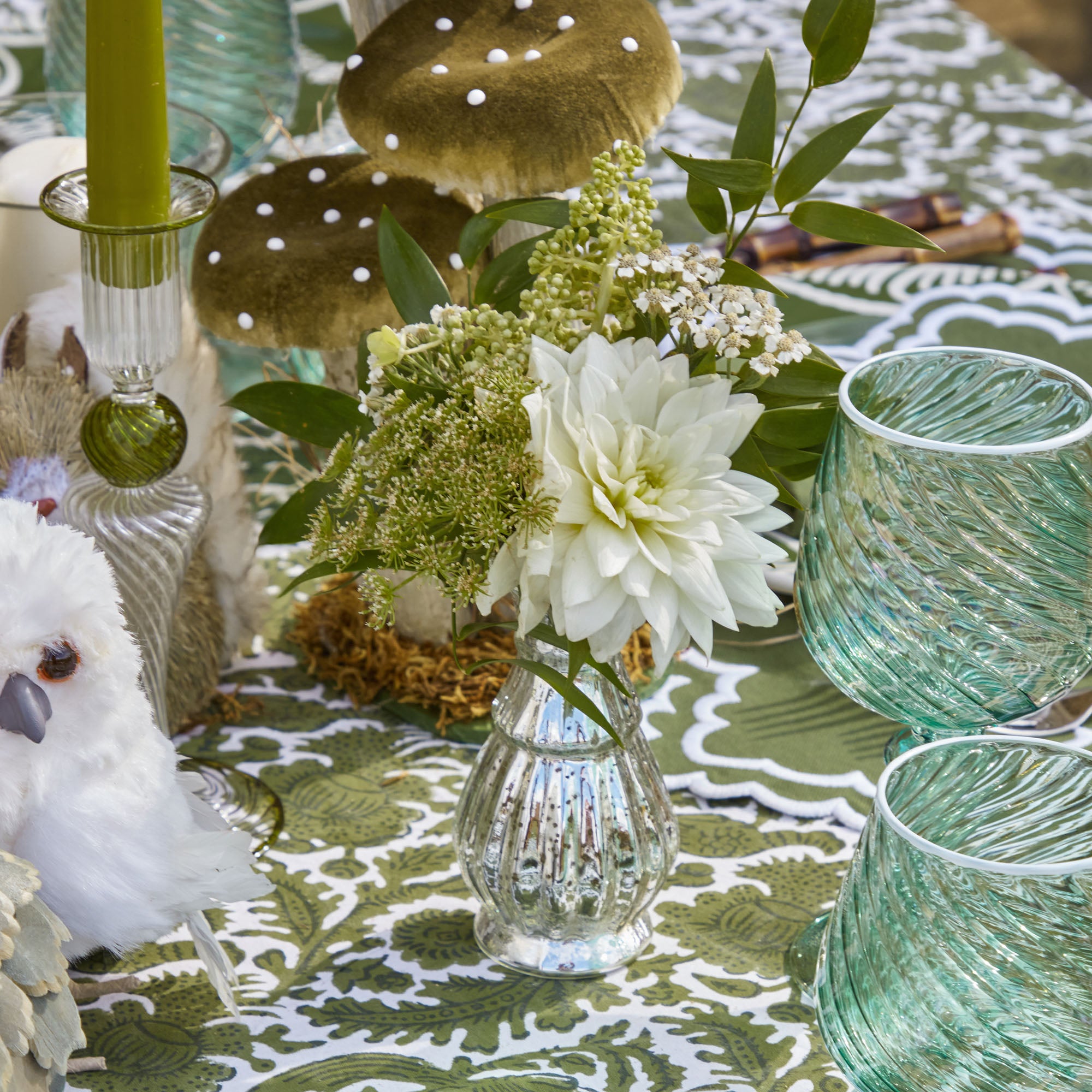 Elevate your floral decor with the vintage allure of mercury glass vases, courtesy of the Trio of Mercury Bud Vases, a trio of vases that exude a timeless and captivating aura.