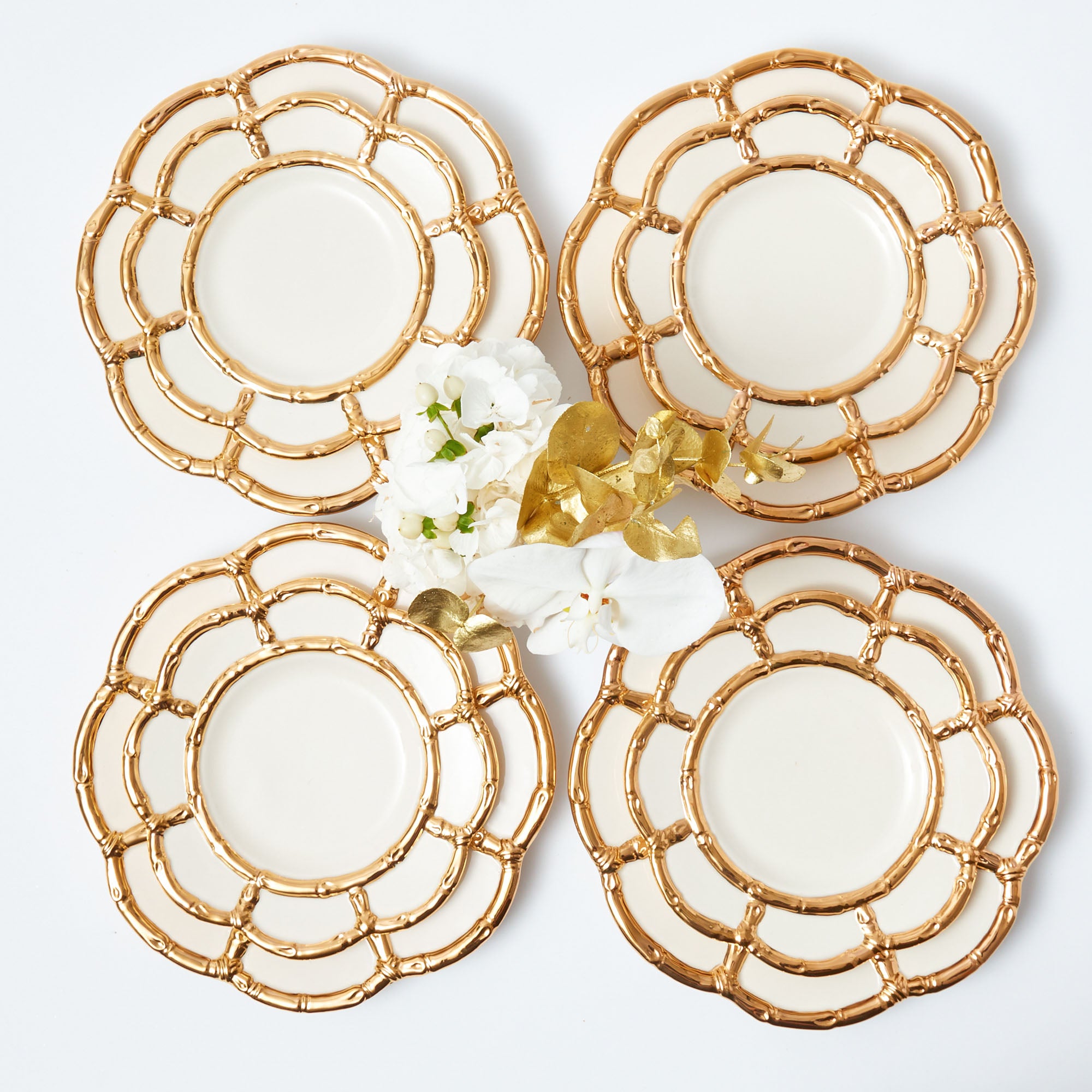 Elevate your dining experience with this set of 8 Gold Petal Bamboo Dinner & Starter Plates.