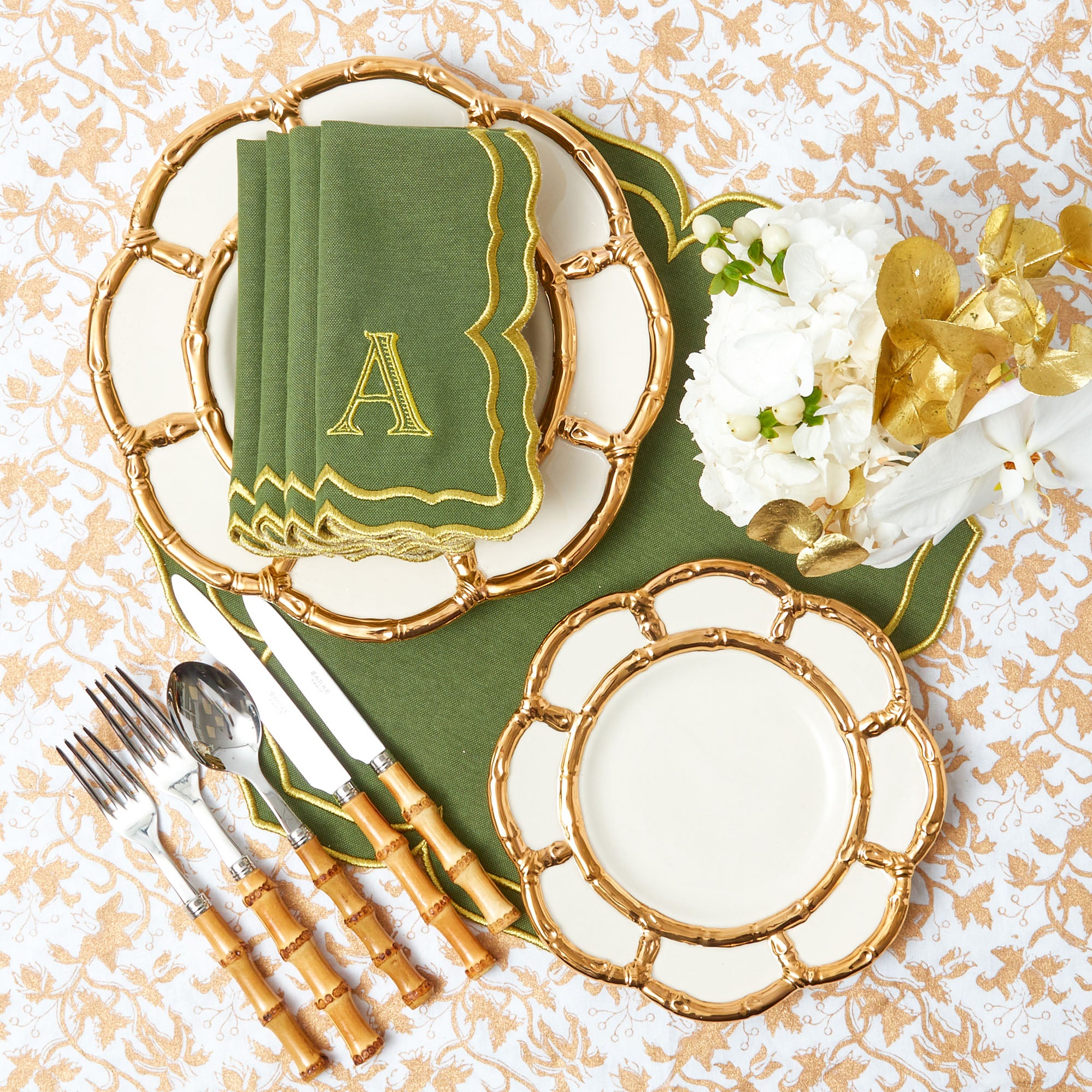 Enhance your table decor with the stunning Gold Petal Bamboo Starter Plates (Set of 4).