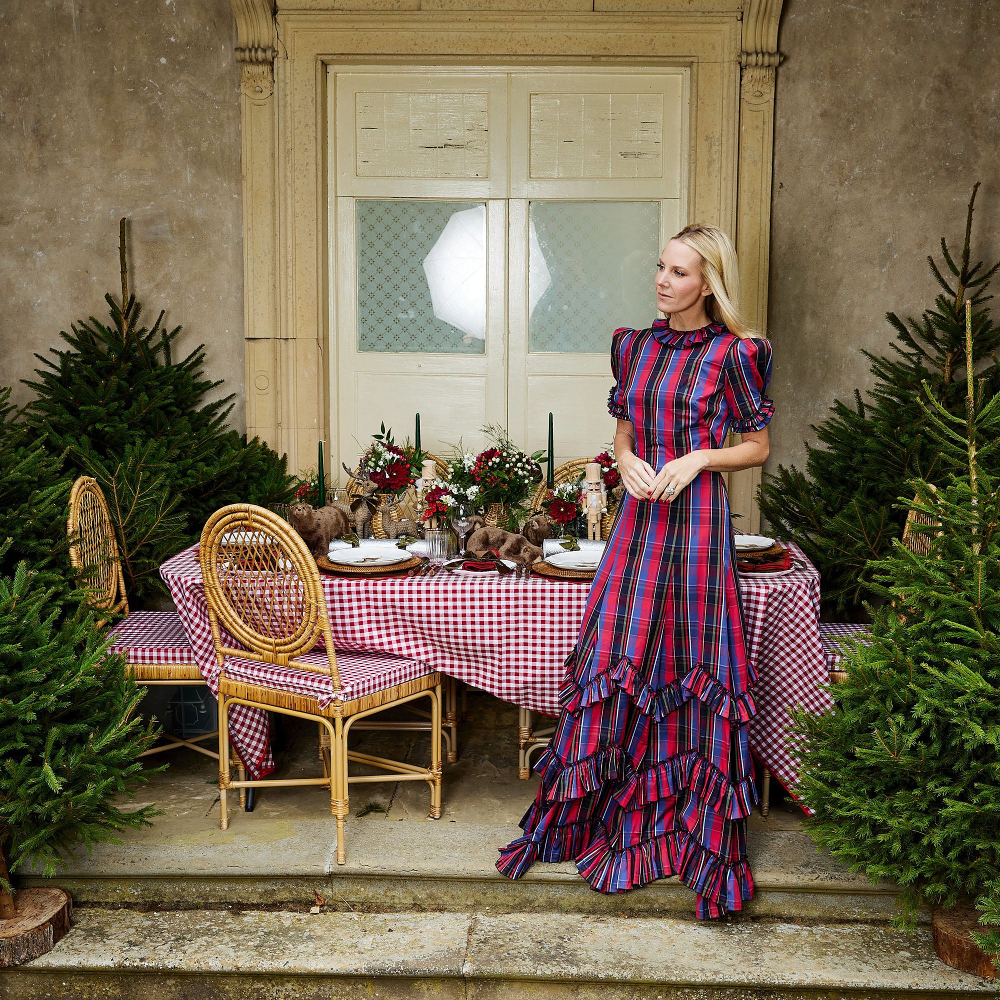 Add a touch of traditional elegance to your holiday settings with the Berry Red Gingham Tablecloth, perfect for infusing your meals with the comforting charm of gingham.