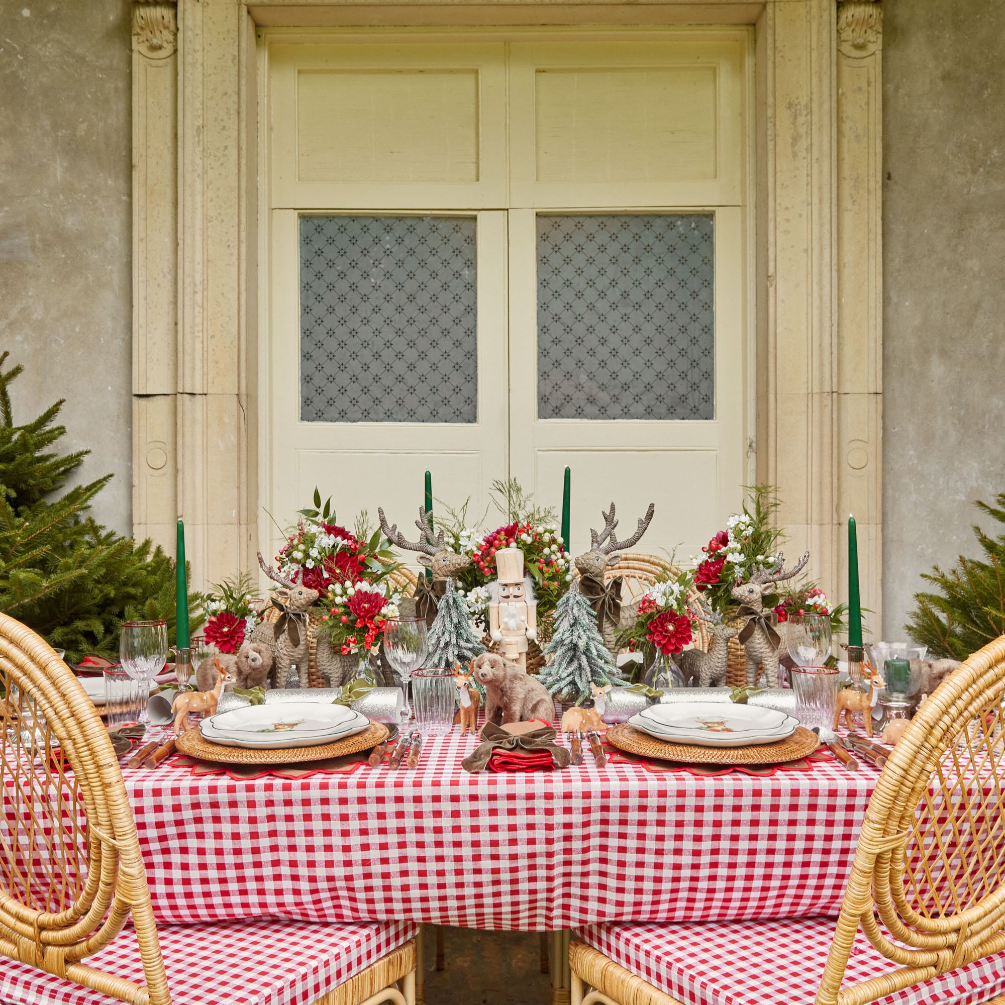 Delight in the timeless charm of the Berry Red Gingham Tablecloth, a classic and festive piece that adds a touch of holiday warmth to your dining occasions.