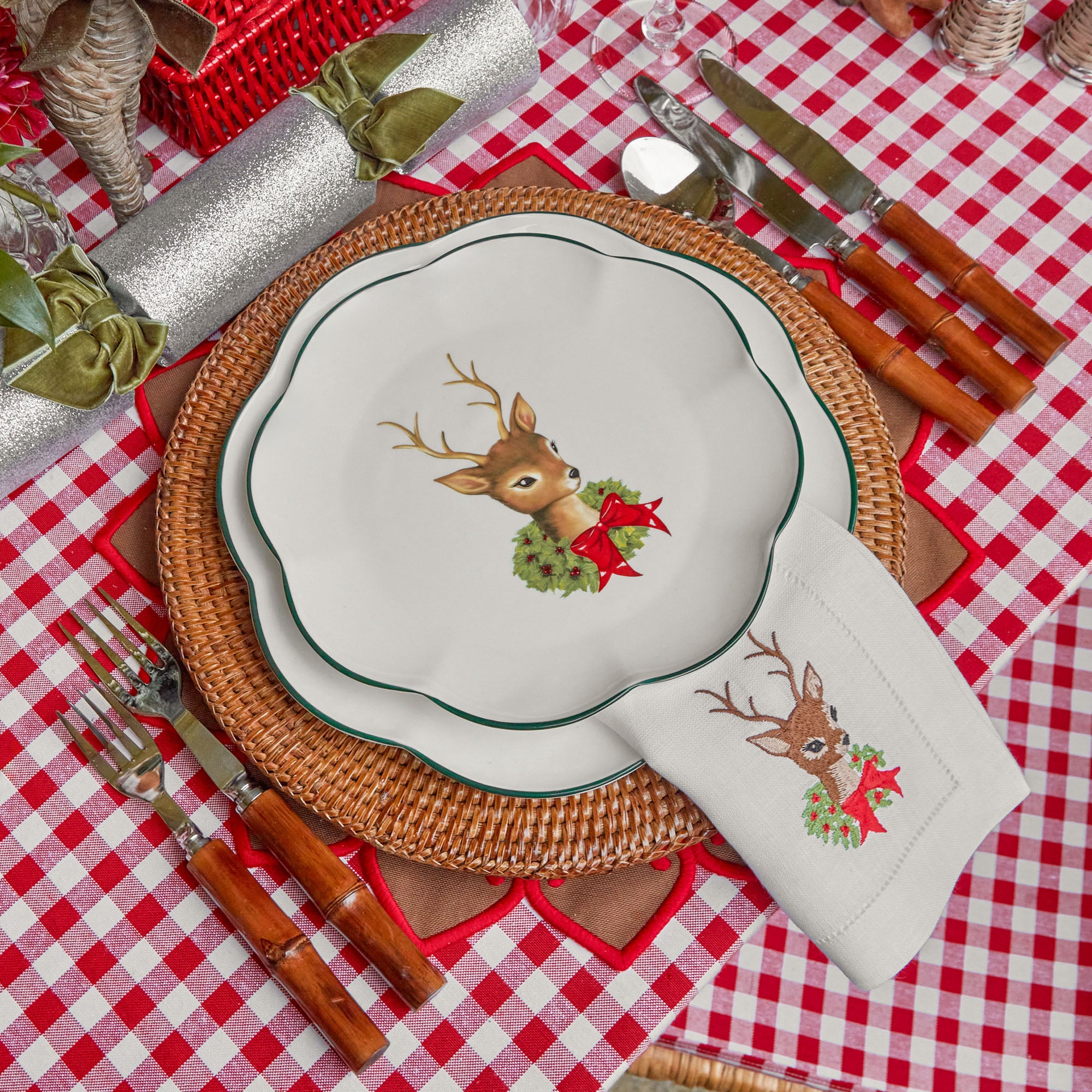 Transport your dining table to a world of classic beauty and holiday cheer with the Berry Red Gingham Tablecloth, perfect for creating an inviting and festive atmosphere that captures the essence of the season.