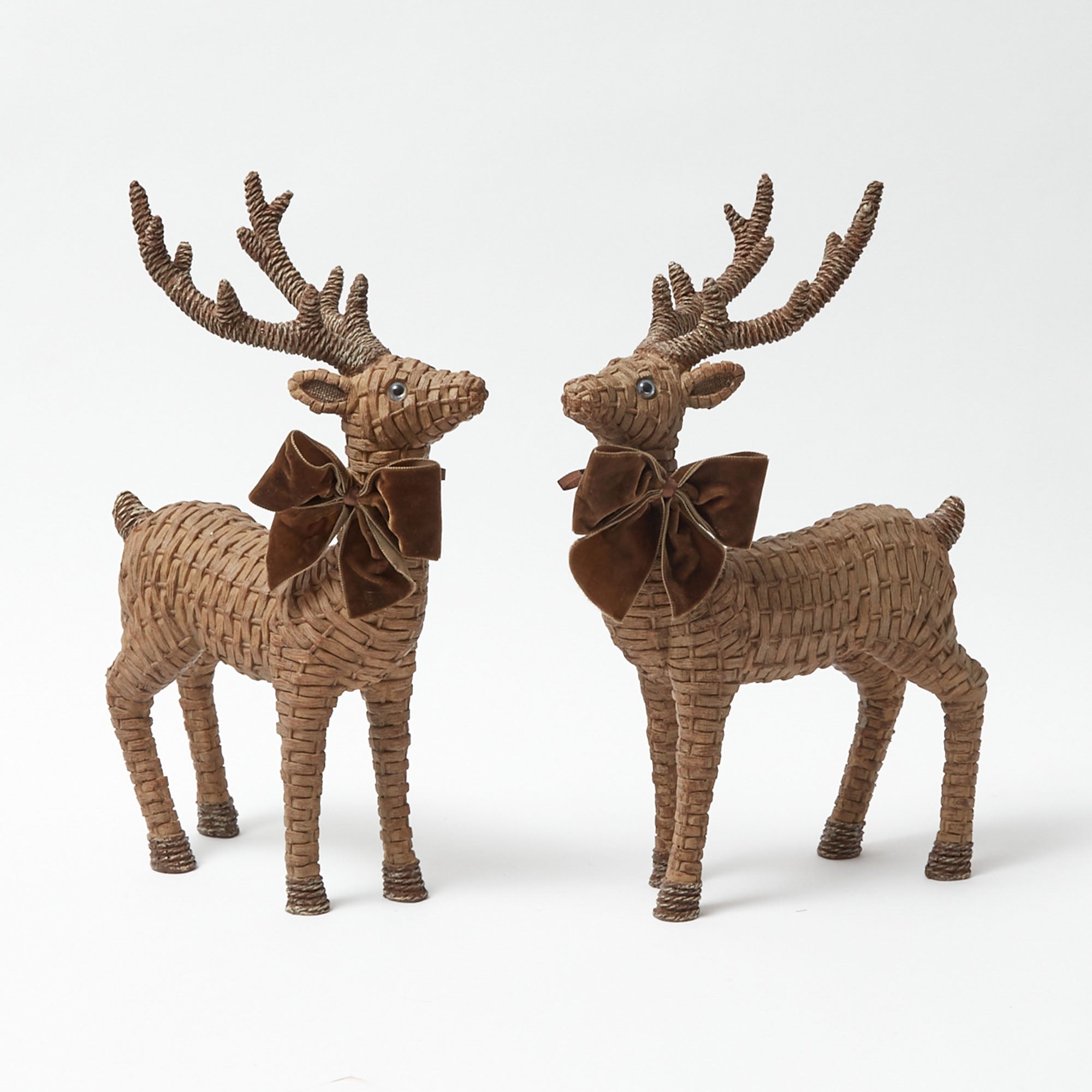 Enhance your winter decor with these majestic Large Rattan Reindeer.