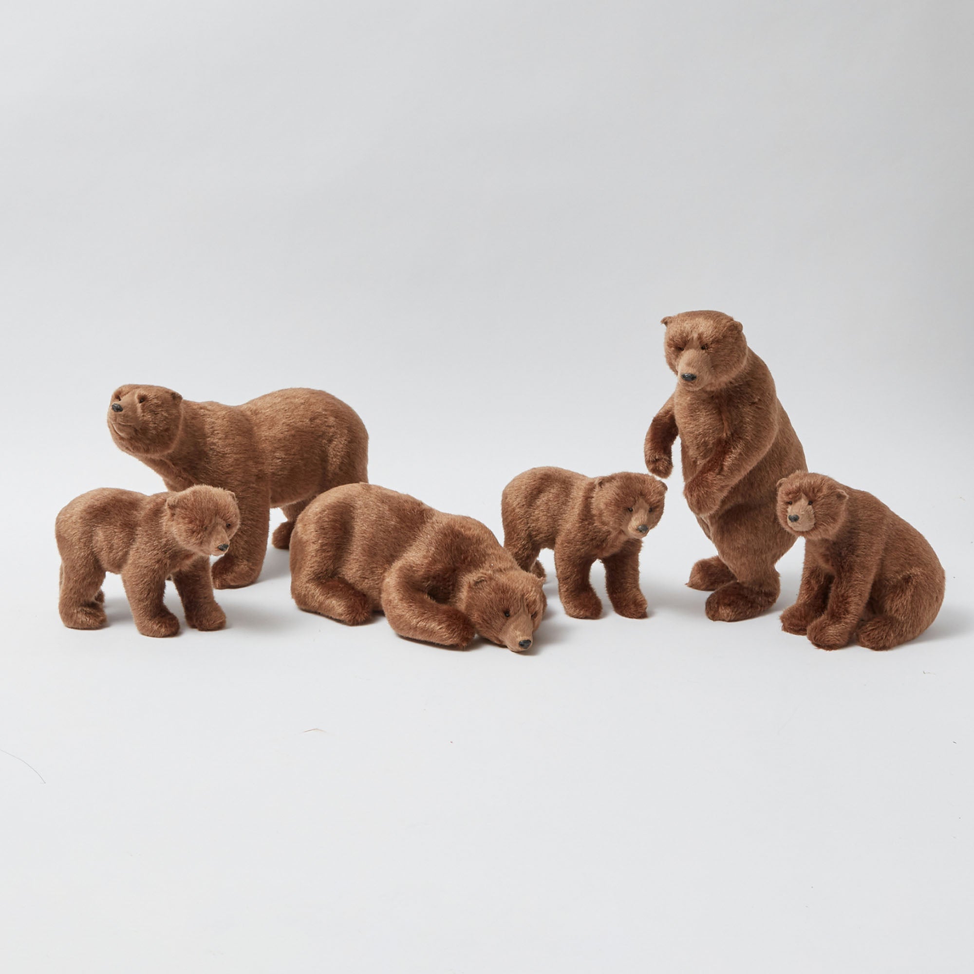 Infuse your decor with the allure of the wilderness using the Large Alpine Brown Bears Set of 3, a charming trio that radiates the beauty of nature.