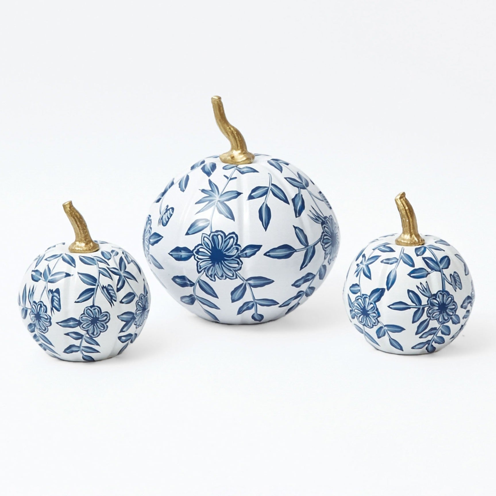 White Chinoiserie Pumpkin Family: Elegance in fall decor.