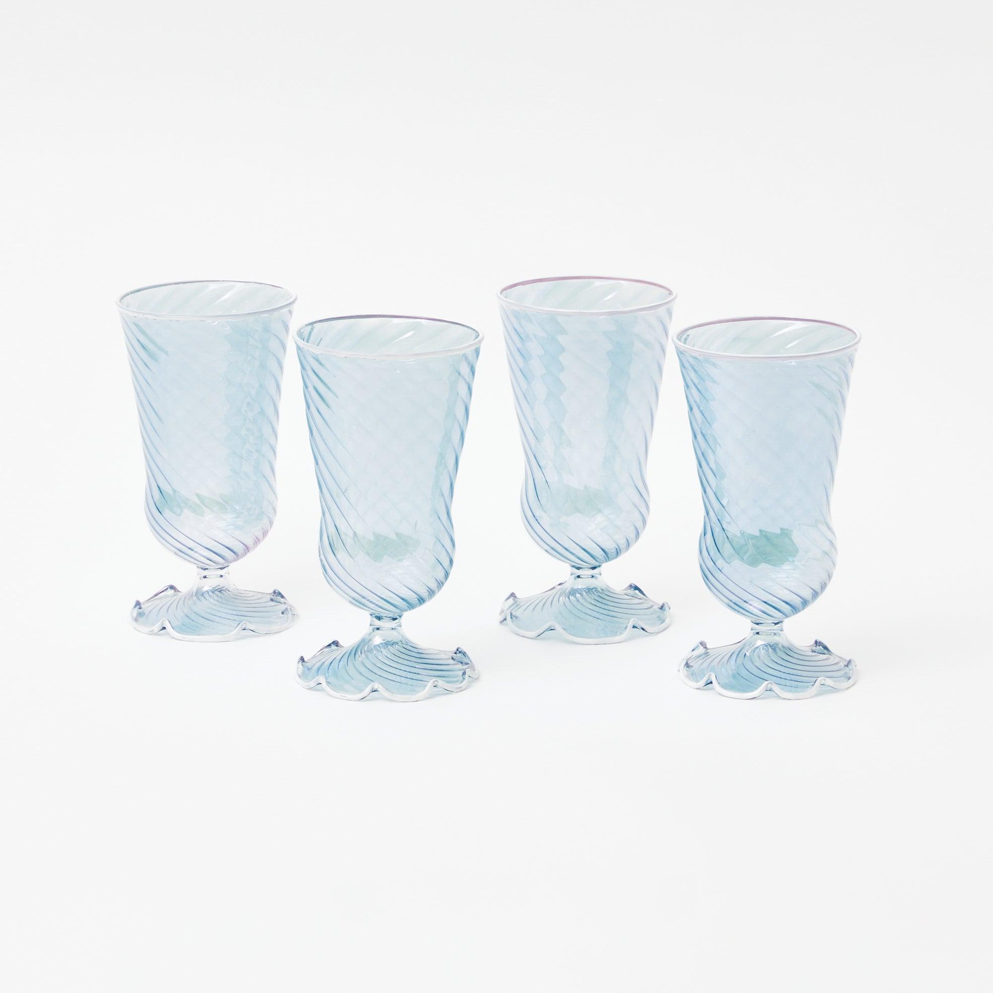 https://www.mrsalice.com/cdn/shop/files/blue-and-white-rim-frilled-glasses-set-of-4-mrs-alice-11.jpg?v=1696172777