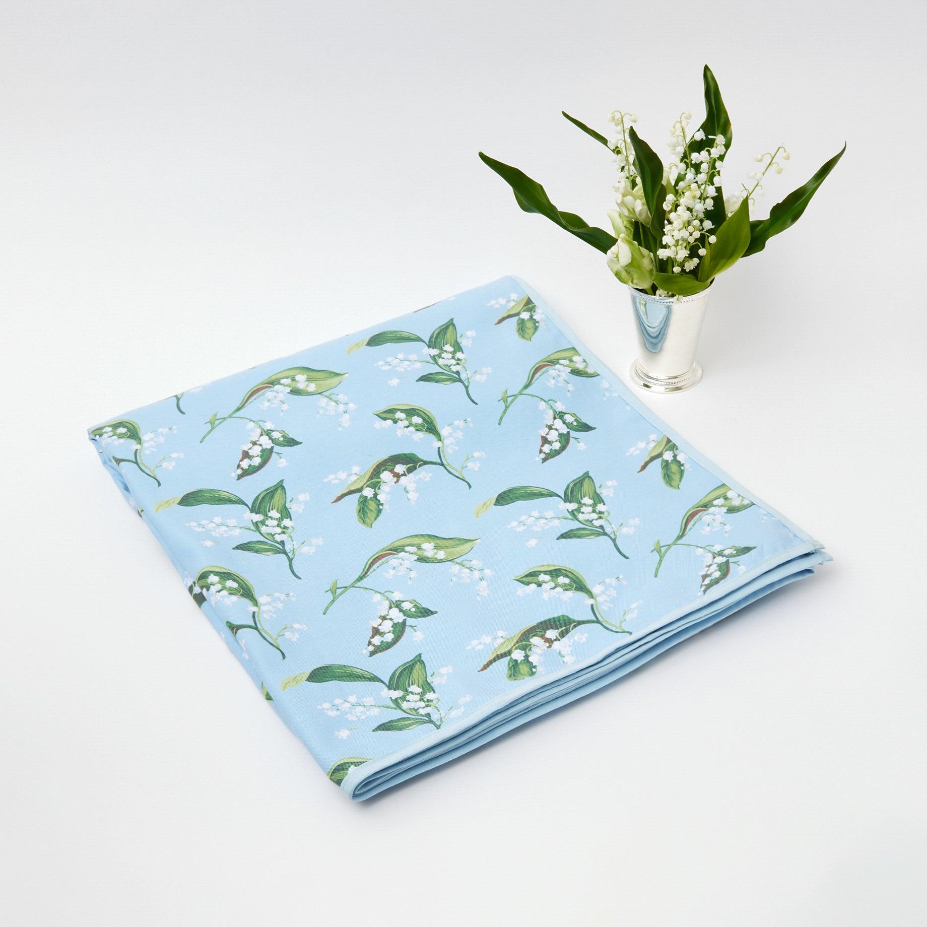 https://www.mrsalice.com/cdn/shop/files/blue-lily-of-the-valley-tablecloth-mrs-alice-16_c79d2ca7-e523-4ee0-9227-34ff0c2693ae.jpg?v=1689349086