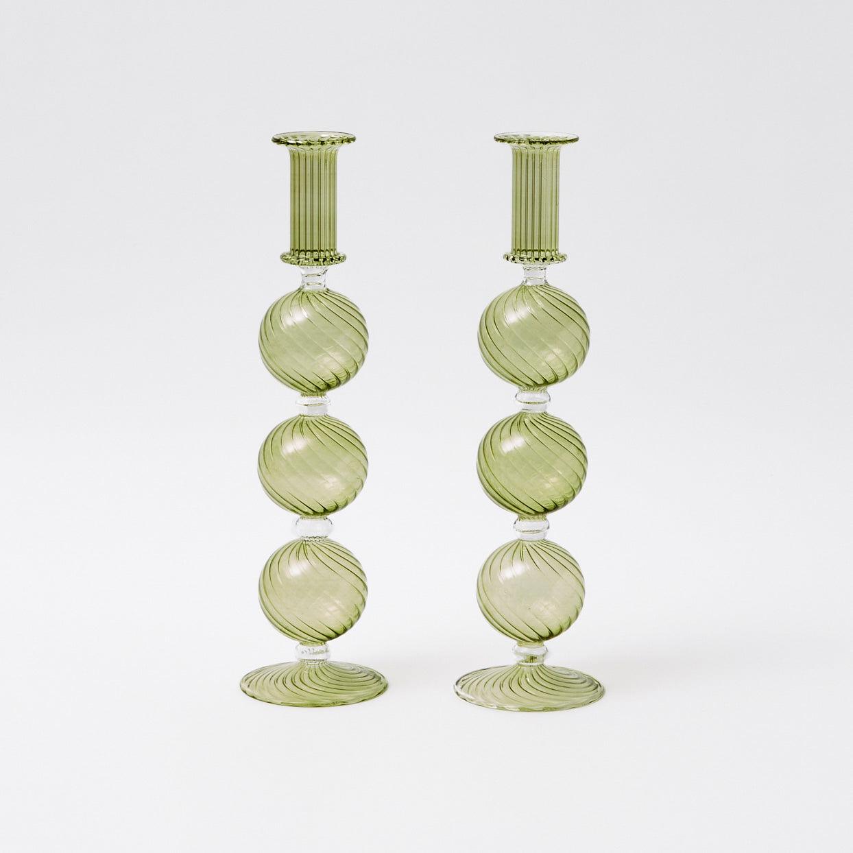 Elevate your Christmas decor with the rustic and elegant beauty of the Camille Olive Candle Holder Pair - a symbol of Christmas warmth and style.