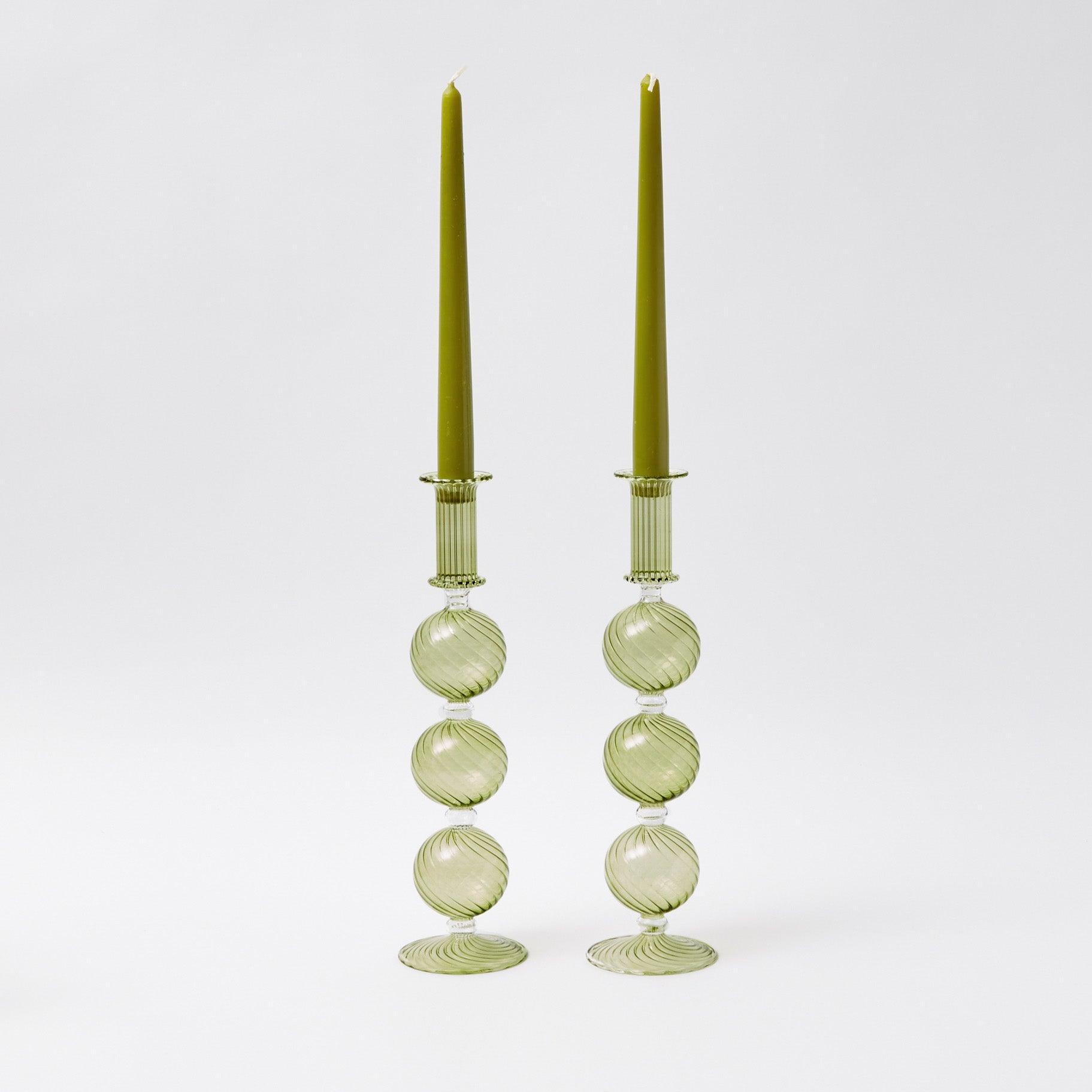 Illuminate your Christmas decor with the Camille Olive Candle Holder Pair - a charming addition to create a warm and inviting holiday atmosphere.