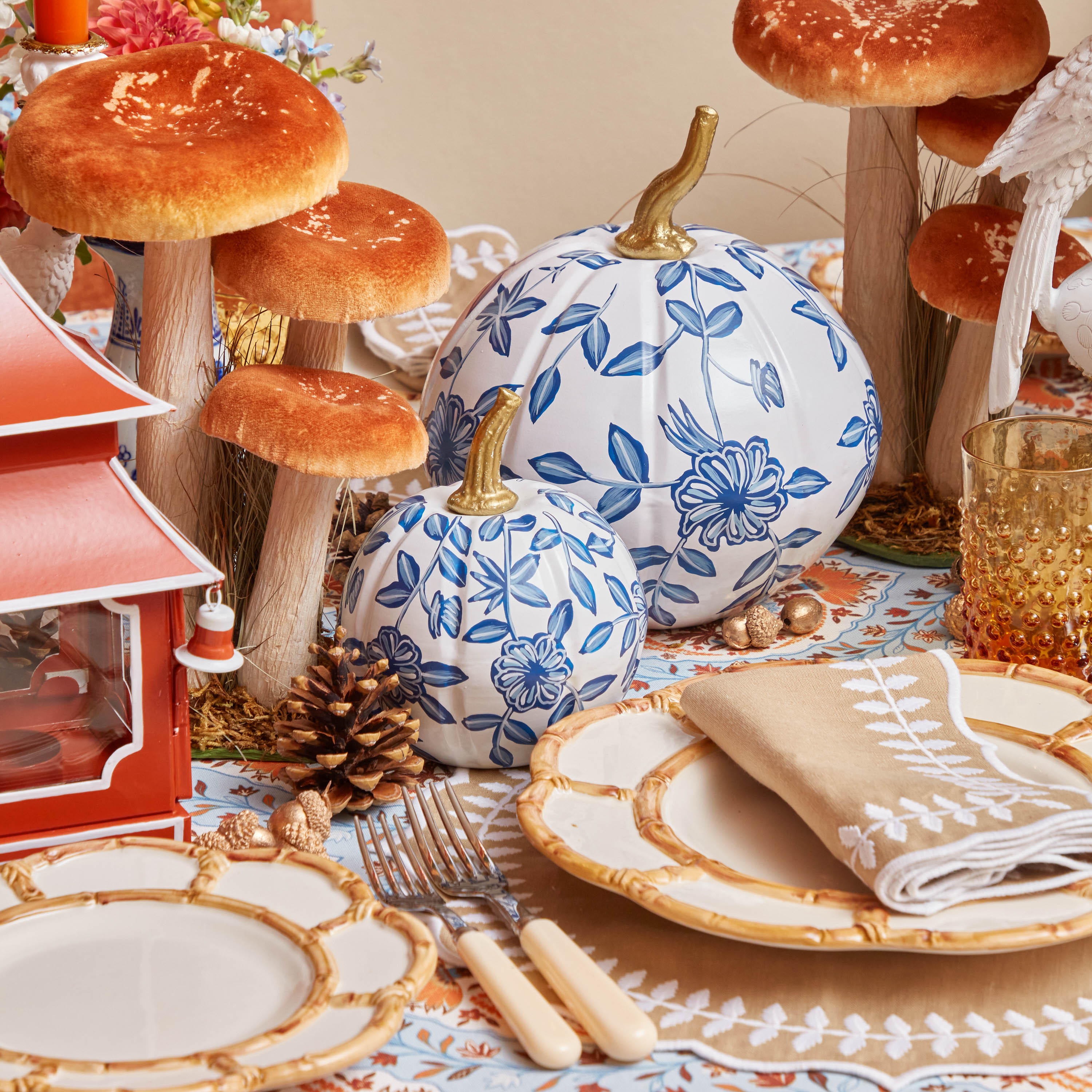 Delightful White Chinoiserie Pumpkin Family: A blend of elegance and autumnal charm.