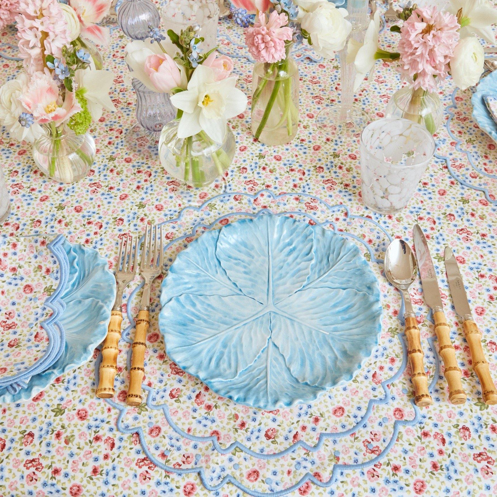 https://www.mrsalice.com/cdn/shop/files/dolly-ditsy-blue-placemats-and-napkins-set-of-4-mrs-alice-8.jpg?v=1689282084