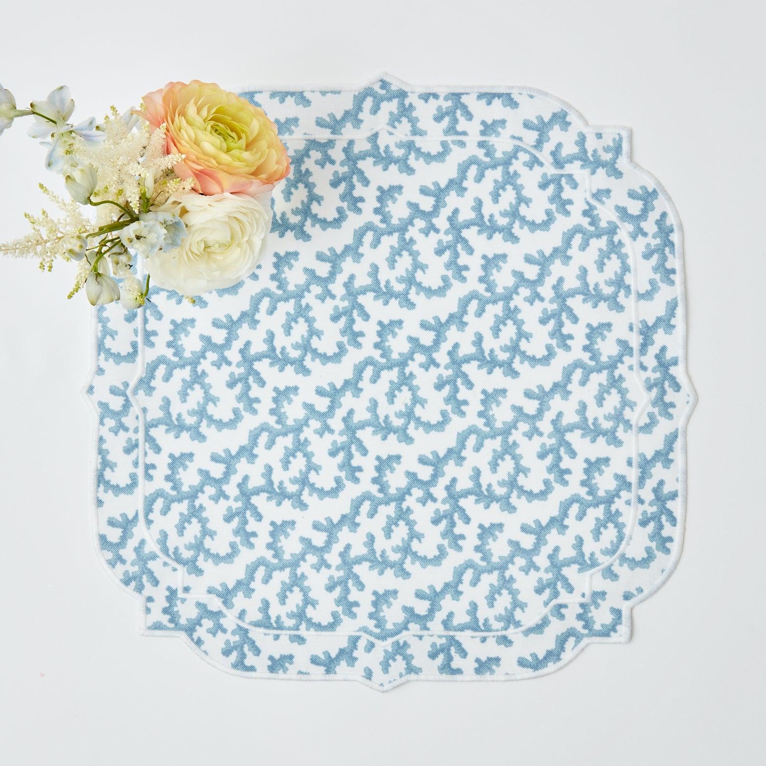 https://www.mrsalice.com/cdn/shop/files/edie-blue-coral-napkins-set-of-4-mrs-alice-12_550a4724-80e2-46f0-b9cd-7fdd158f1410.jpg?v=1689320639