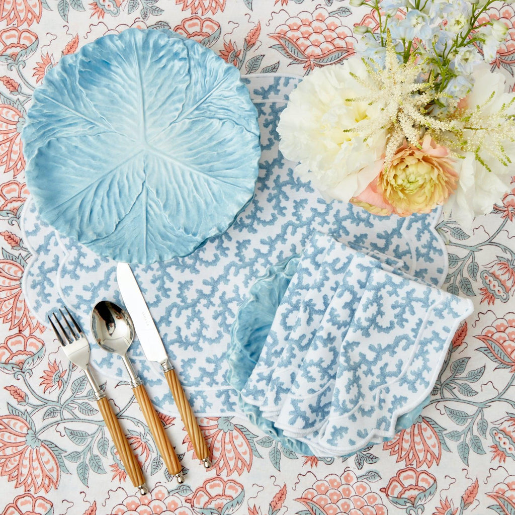 https://www.mrsalice.com/cdn/shop/files/edie-blue-coral-napkins-set-of-4-mrs-alice-9_92ded620-a531-4d2a-b796-8cd42693535c_1024x.jpg?v=1689320630