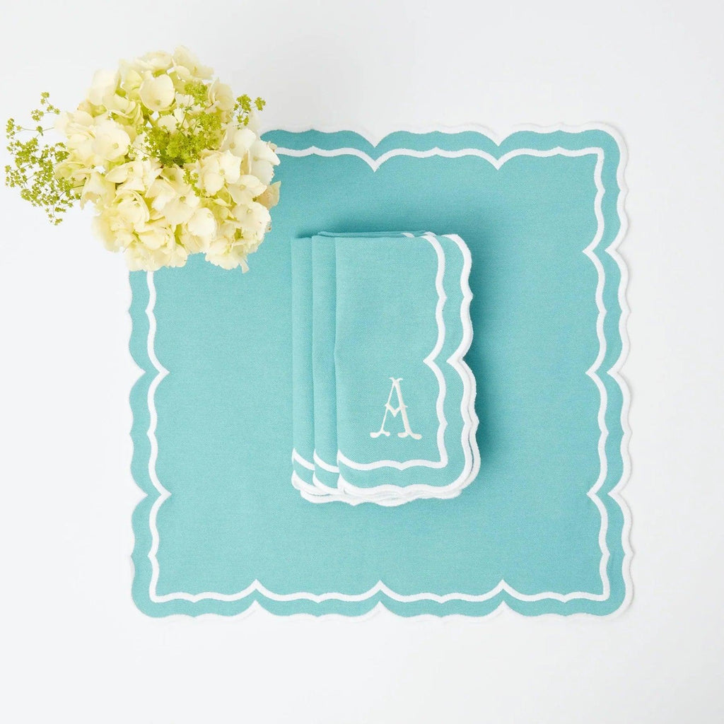 https://www.mrsalice.com/cdn/shop/files/fleur-turquoise-napkins-set-of-4-mrs-alice-1_954863fd-42c9-4f6c-91d3-a3d44f7a8013_1024x.jpg?v=1692192942