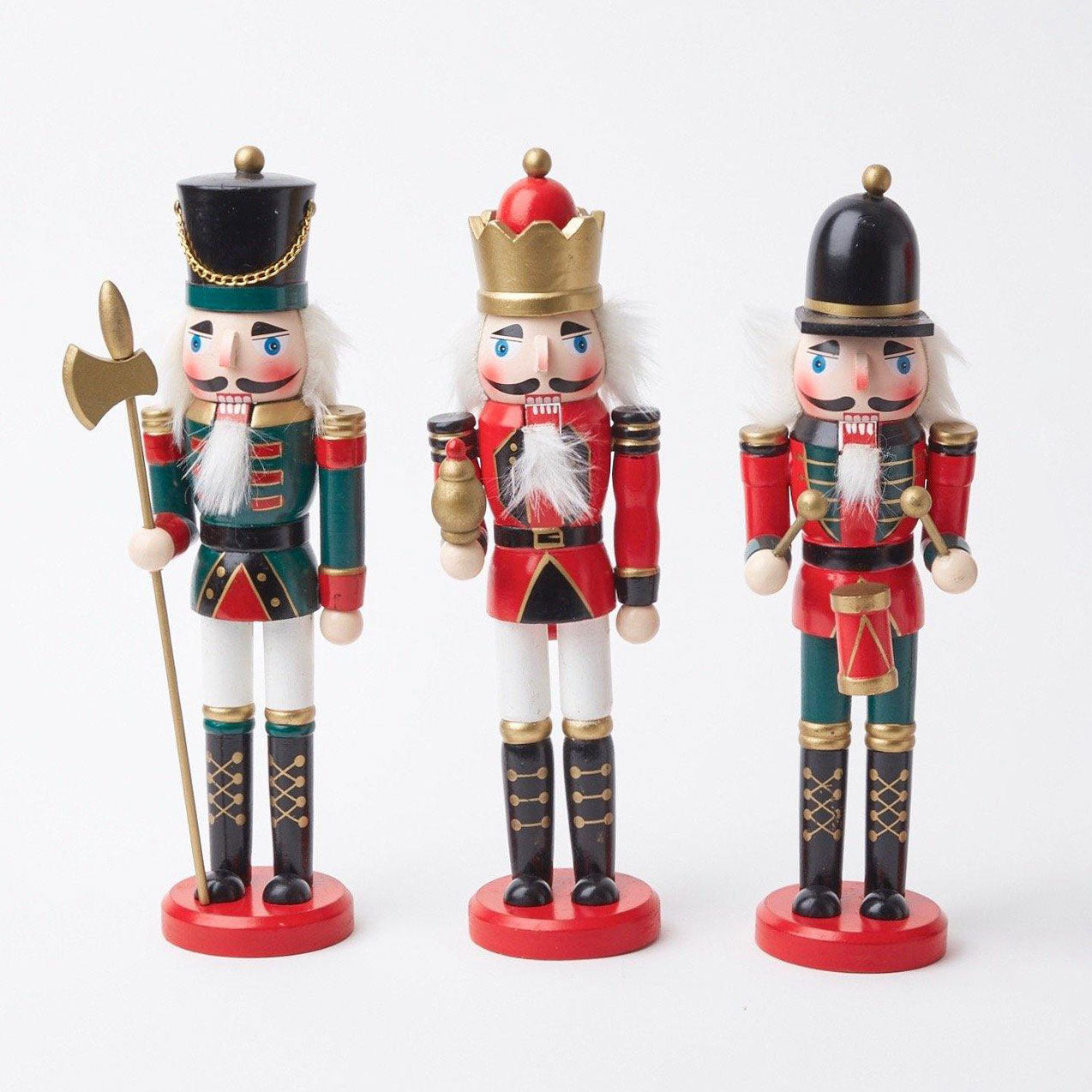 Elevate your holiday decor with the Jolly Nutcracker Trio, a delightful trio of nutcracker figures that bring a touch of whimsy and tradition to your seasonal celebrations.