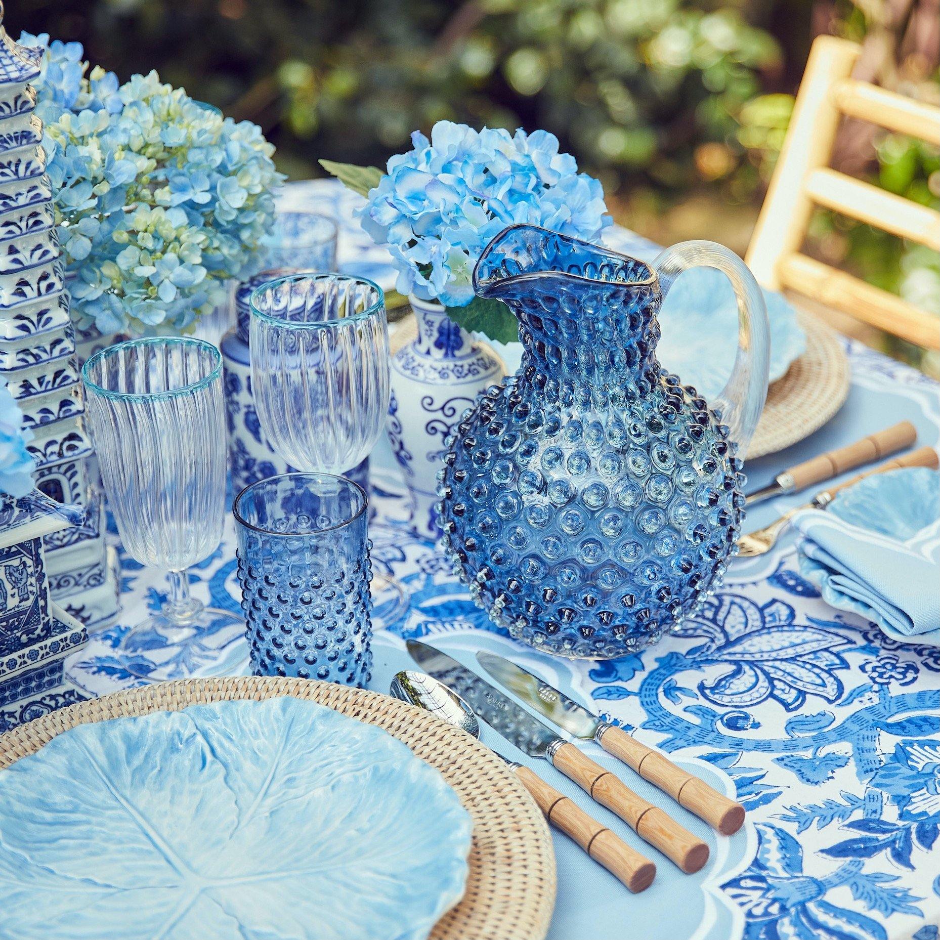 Elevate your drinking experience with our Hobnail Navy Glasses & Jug Set - a simple yet luxurious statement of glassware sophistication.