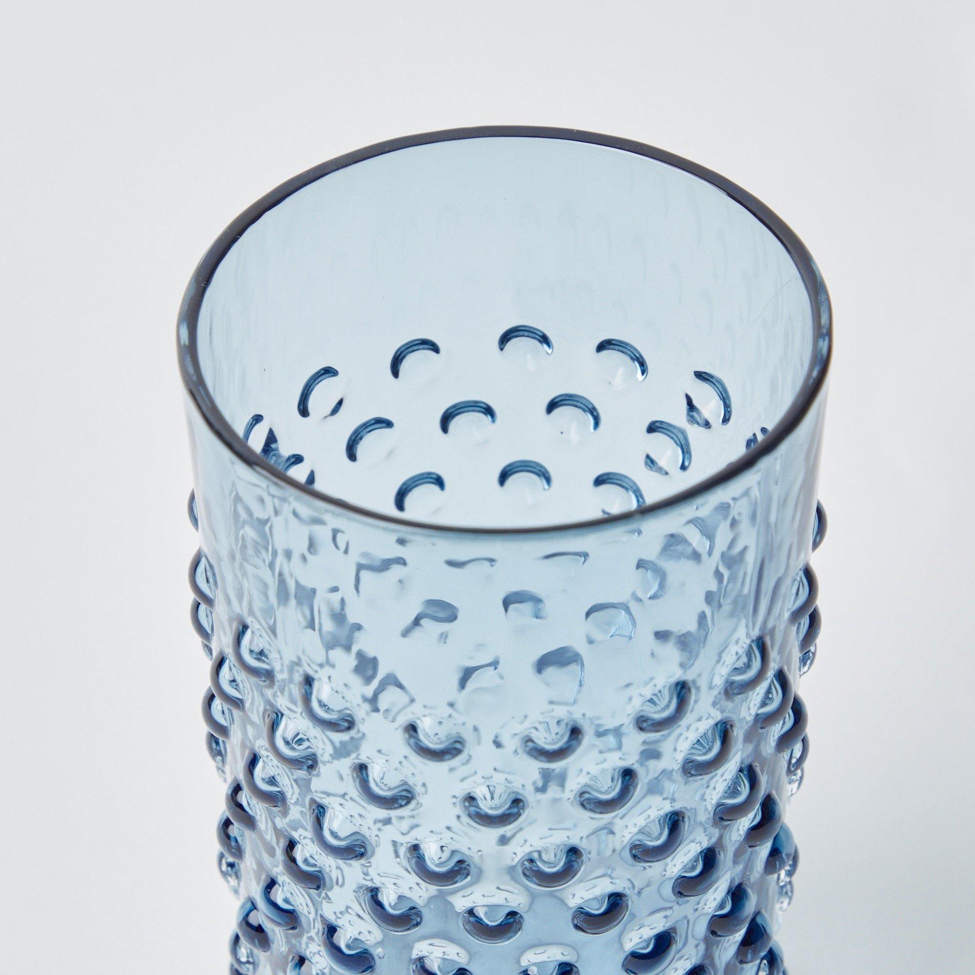 Elevate your dining experience with the opulent beauty of our Set of 6 Hobnail Navy Glasses - a tribute to timeless elegance.