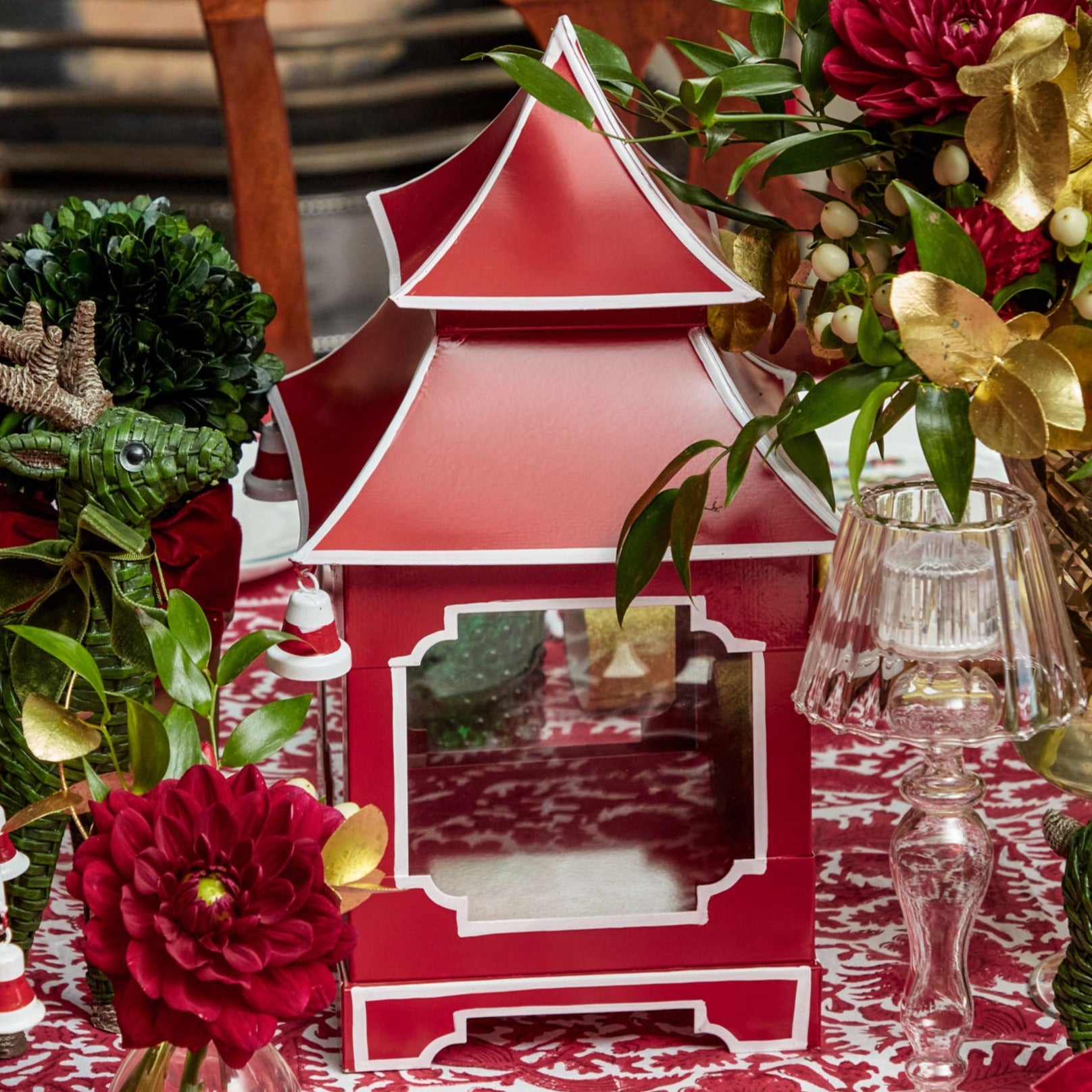 Add a pop of color to your living space with the Berry Red Pagoda Lantern, perfect for creating a lively and inviting atmosphere.