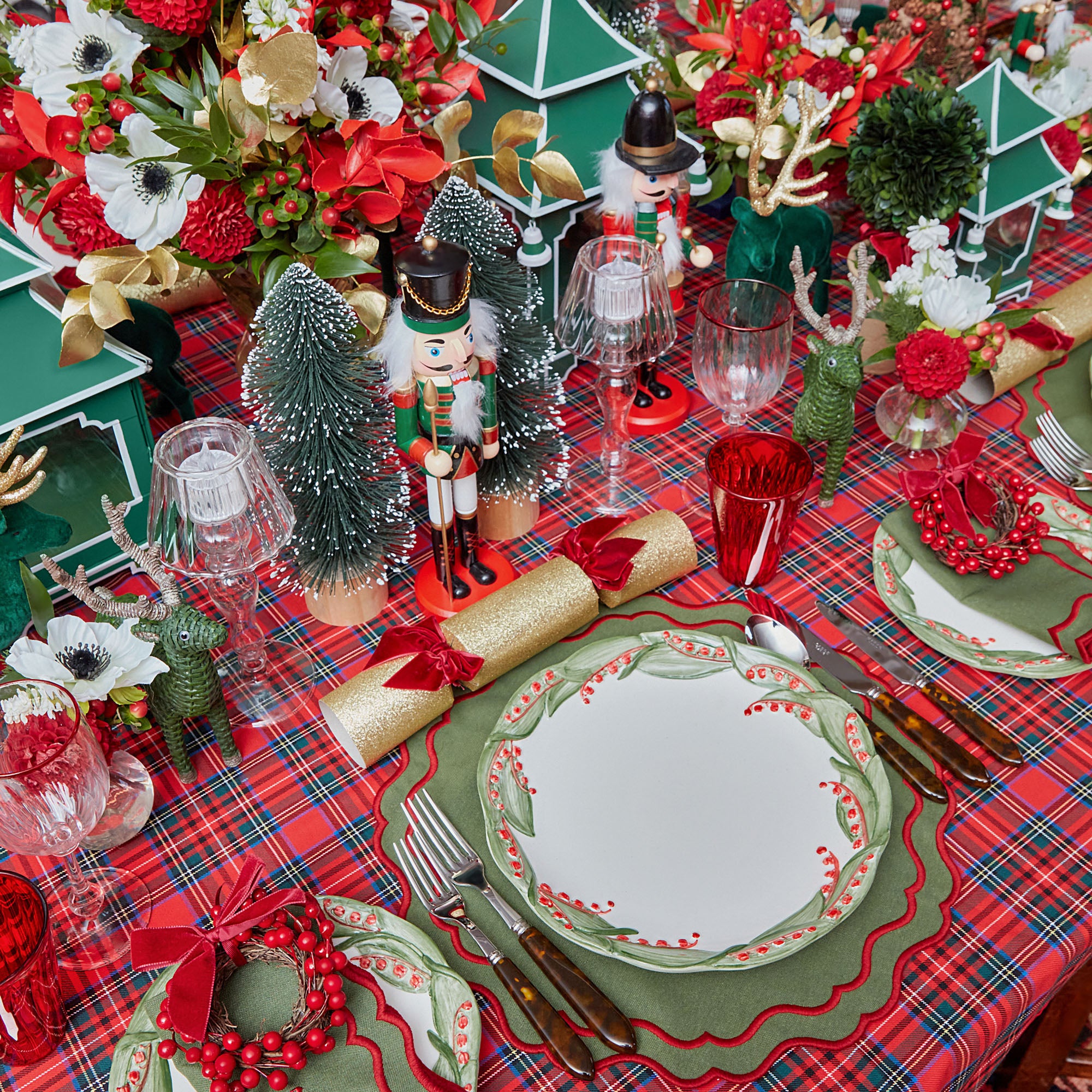 Decorate your home with the timeless charm of the Jolly Nutcracker Trio, a trio of nutcracker figures that evoke the magic and tradition of the holiday season.