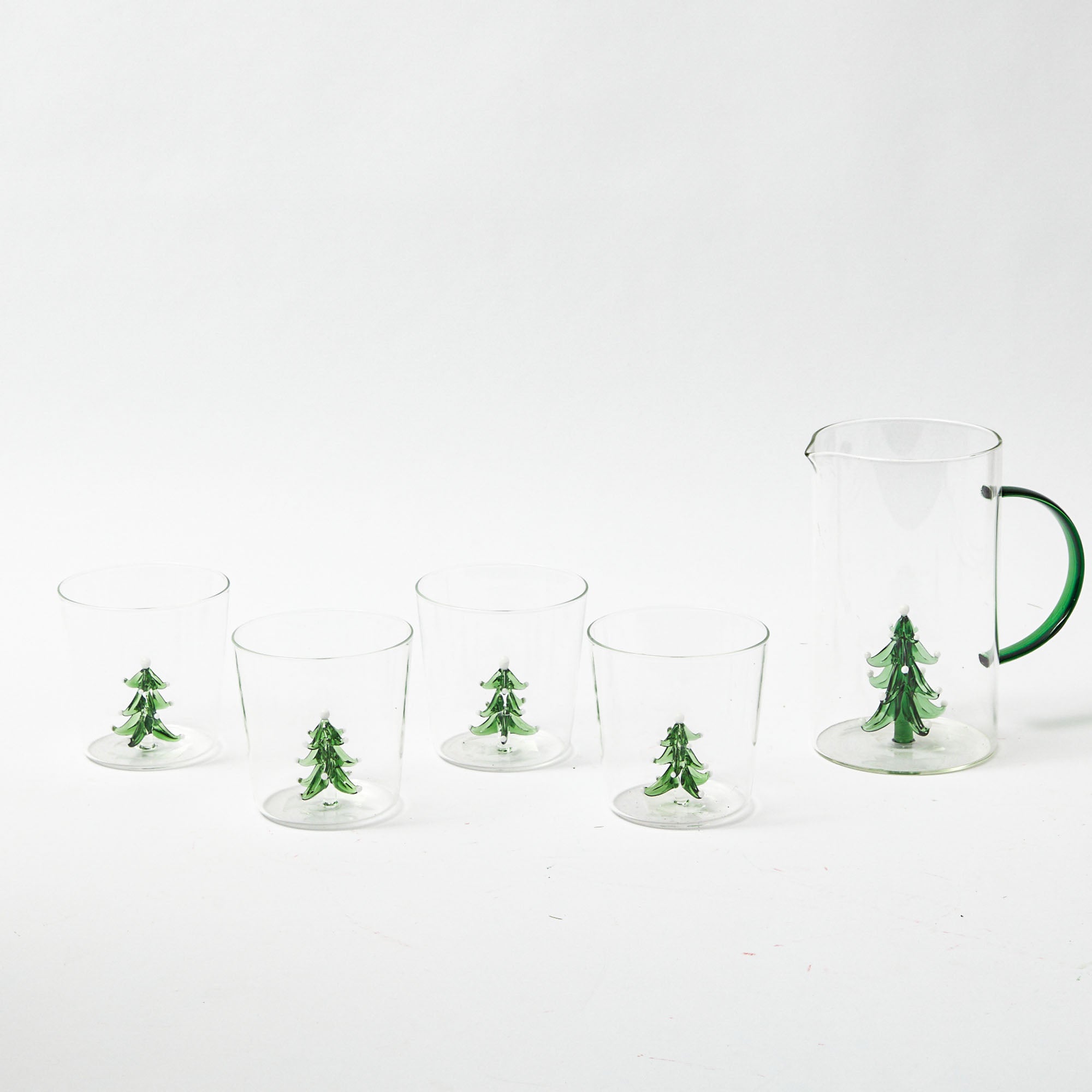 Make your holiday celebrations extra special with the Christmas Tree Jug, a charming jug that embodies the spirit of Christmas and transforms your table into a cheerful and enchanting setting.