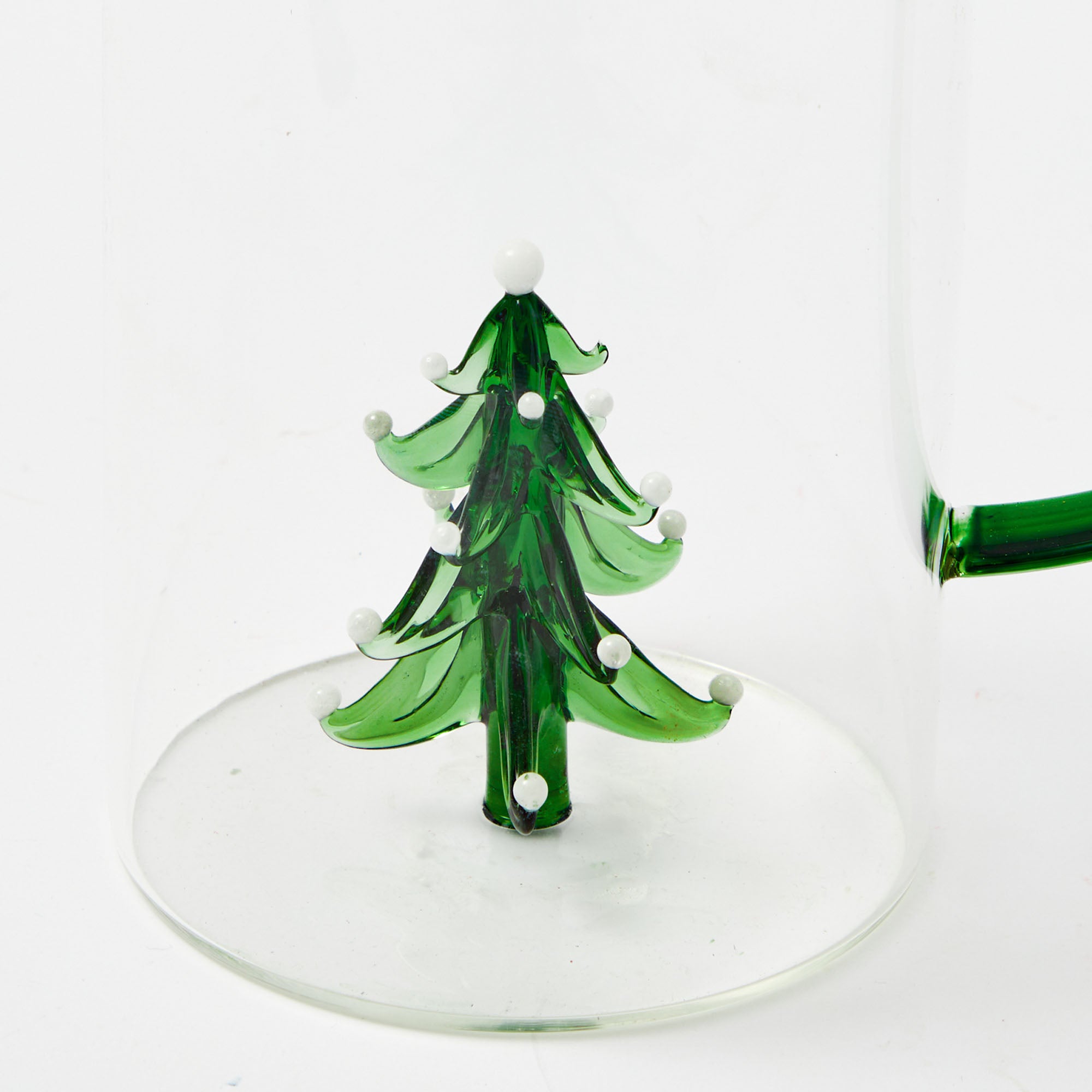 Brighten your holiday decor with the festive presence of the Christmas Tree Jug, ideal for creating a cozy and inviting atmosphere that embodies the joy and delight of Christmas.