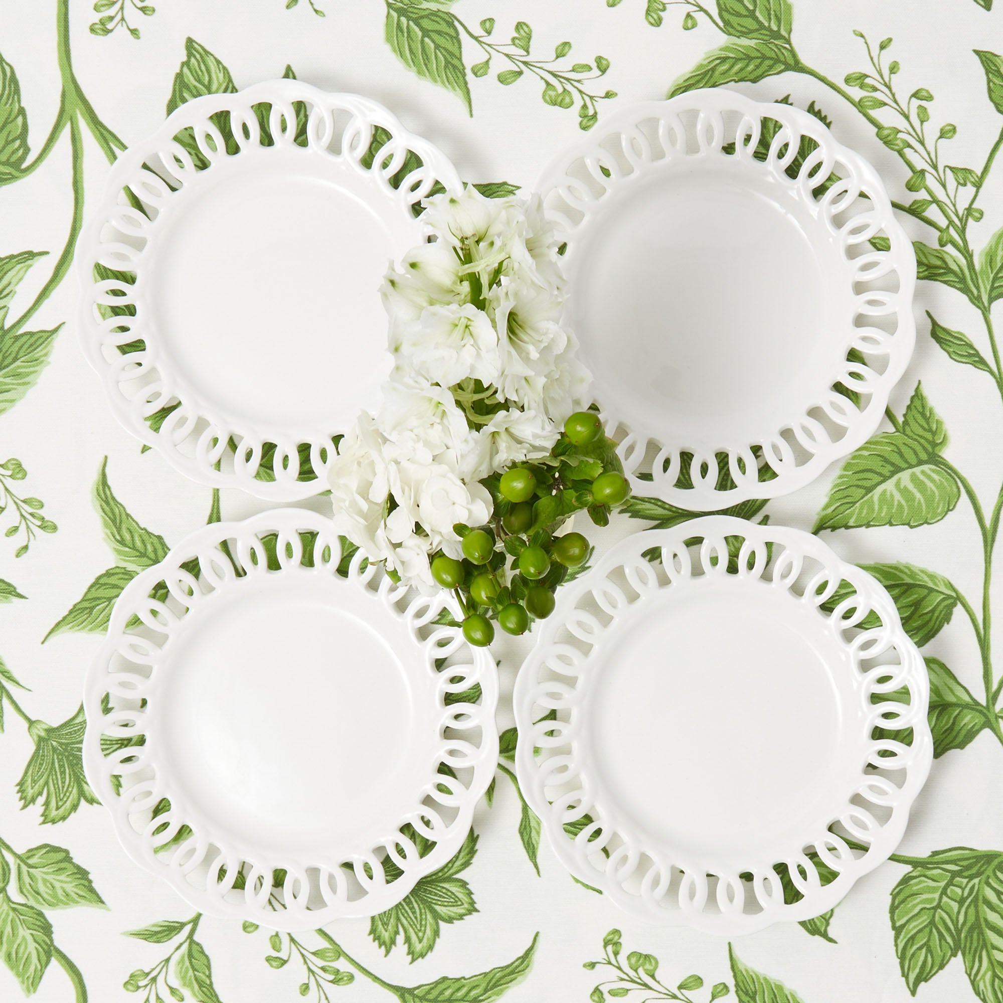 Make each holiday meal a celebration of tradition with our Set of 4 White Lace Starter Plates, perfect for serving your holiday appetizers with elegance and sophistication.