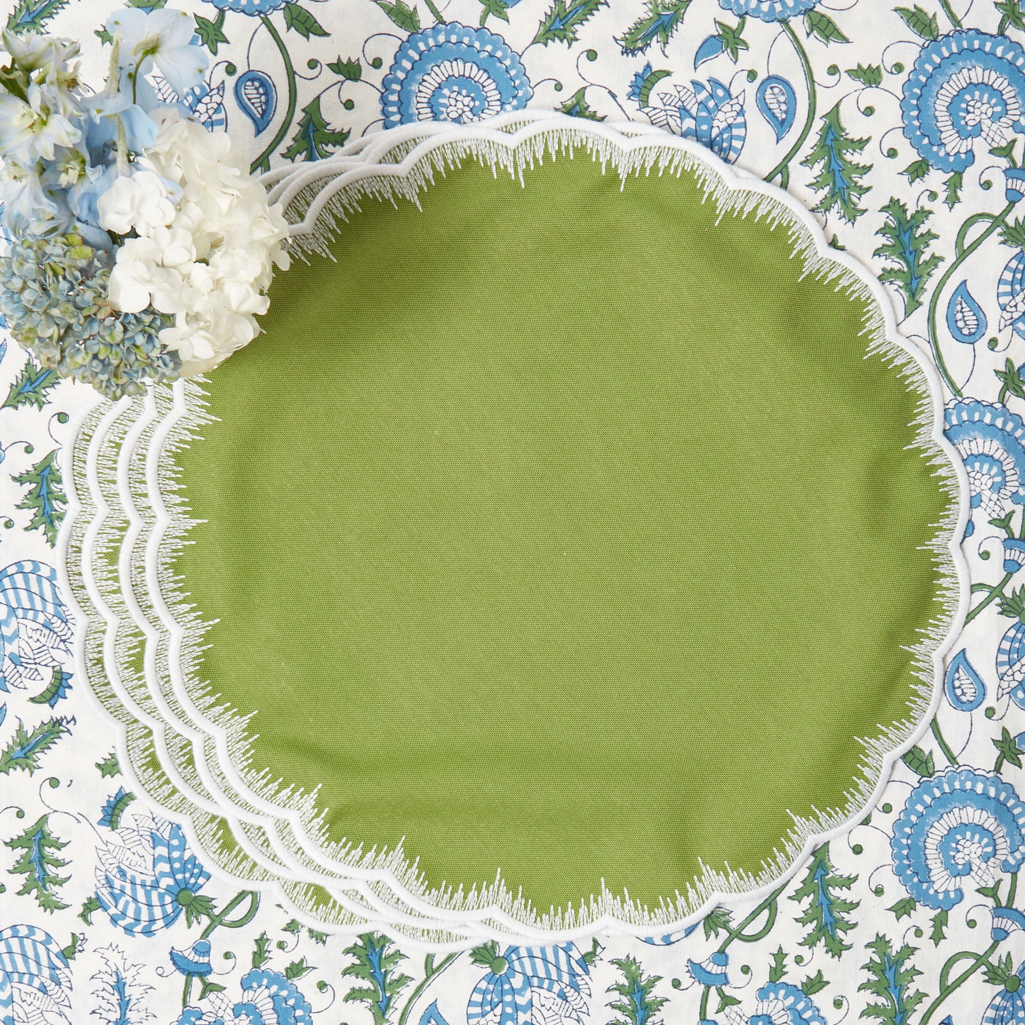 Apple Green Isabella Round Placemats (Set of 4): Elevate your dining experience with vibrant elegance.