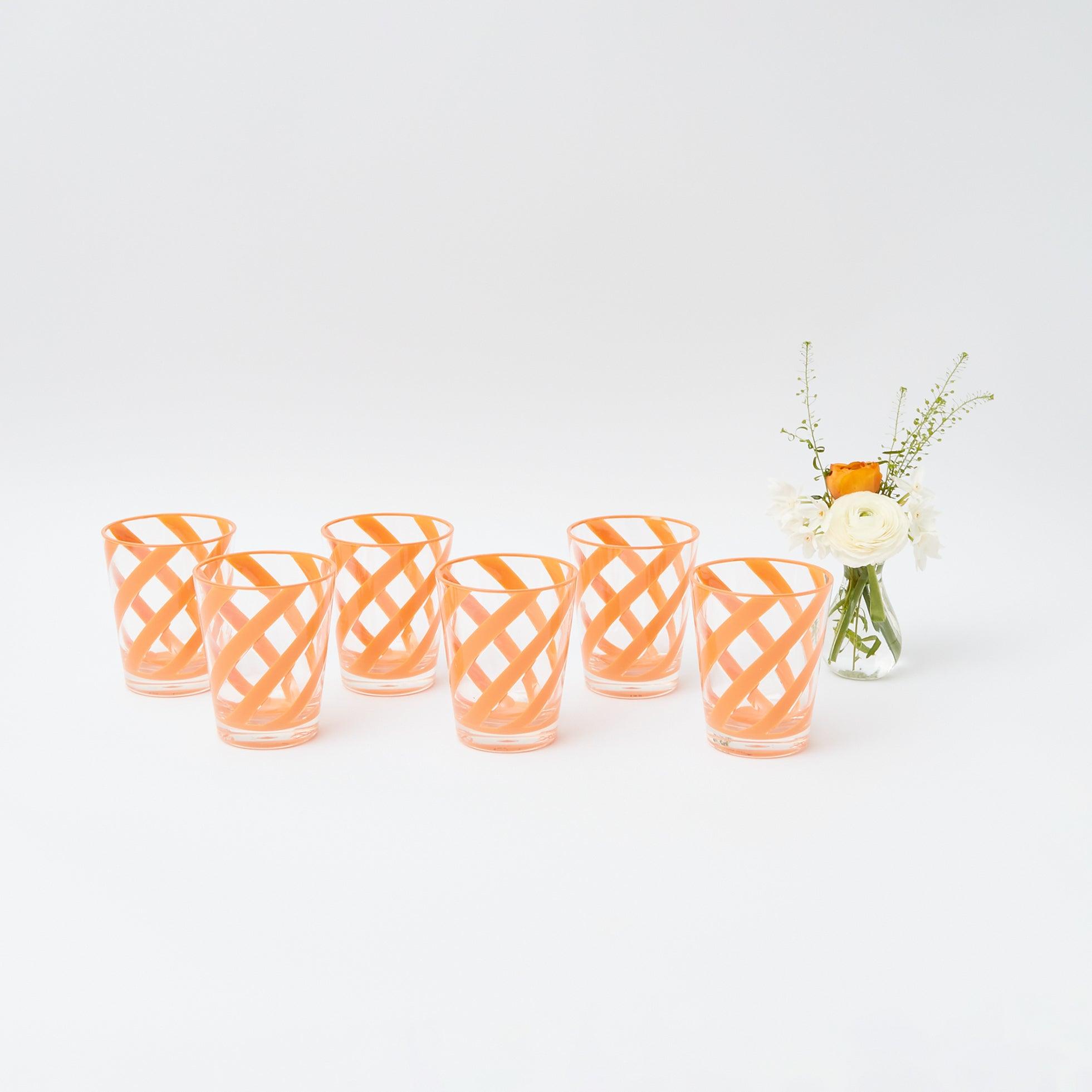 https://www.mrsalice.com/cdn/shop/files/orange-swirl-outdoor-glasses-set-of-6-mrs-alice-27_cfa32ffe-0fde-40f0-9104-075f1887c7a4.jpg?v=1689367213