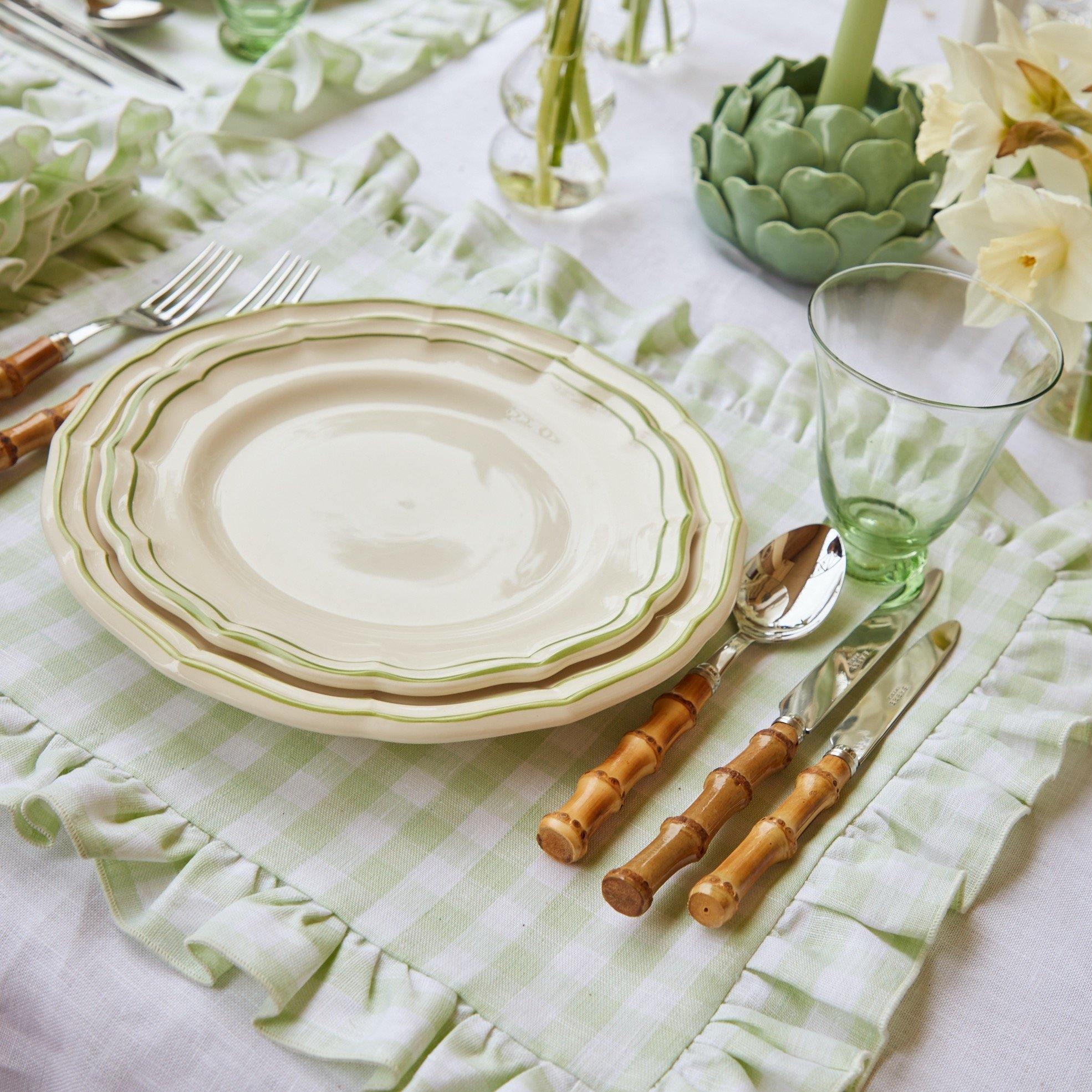 https://www.mrsalice.com/cdn/shop/files/pistachio-gingham-ruffle-linen-placemats-set-of-4-mrs-alice-9_5b48b344-5fb8-4306-8dc3-3727c4811fd0.jpg?v=1689277834