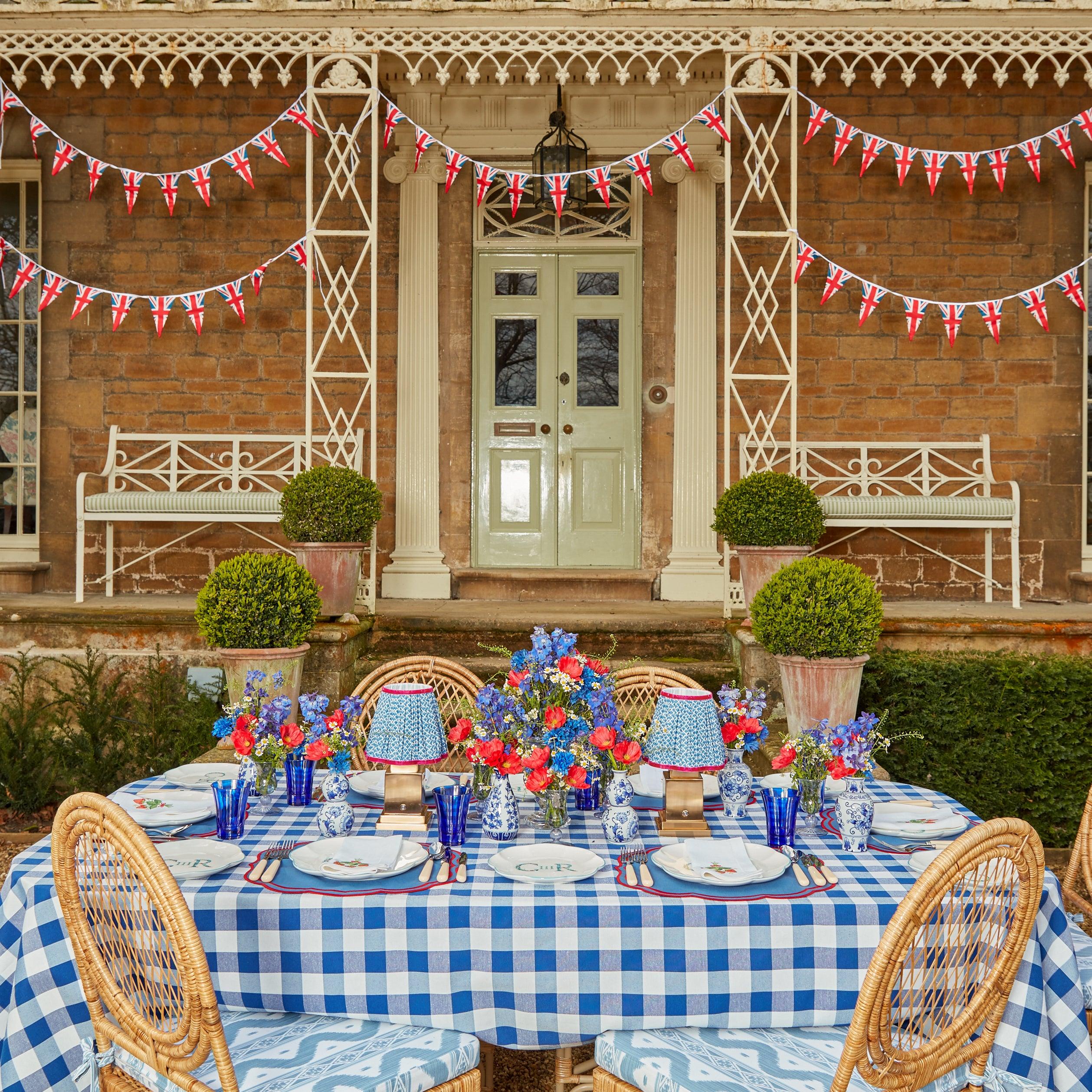 Four Positano glasses, each in a vivid and luxurious royal blue.