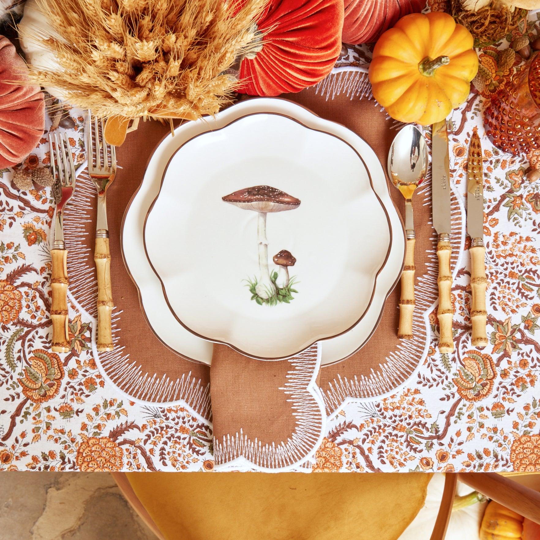 Crafted for durability and style, the Scalloped Mushroom Starter Plate set (Brown) is a must-have for any discerning host (Set of 24).