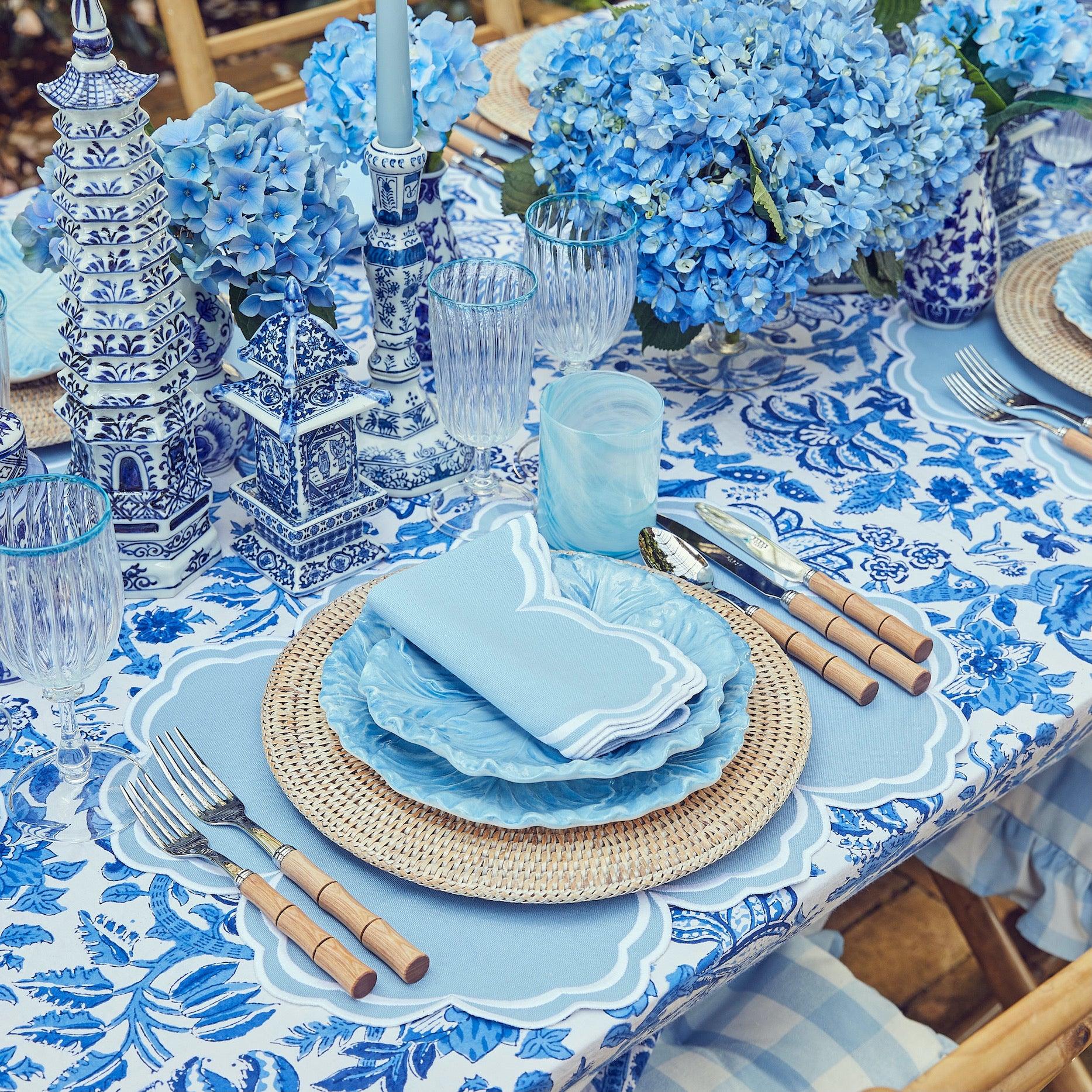 https://www.mrsalice.com/cdn/shop/files/serena-cornflower-blue-napkins-set-of-4-mrs-alice-5.jpg?v=1689263263