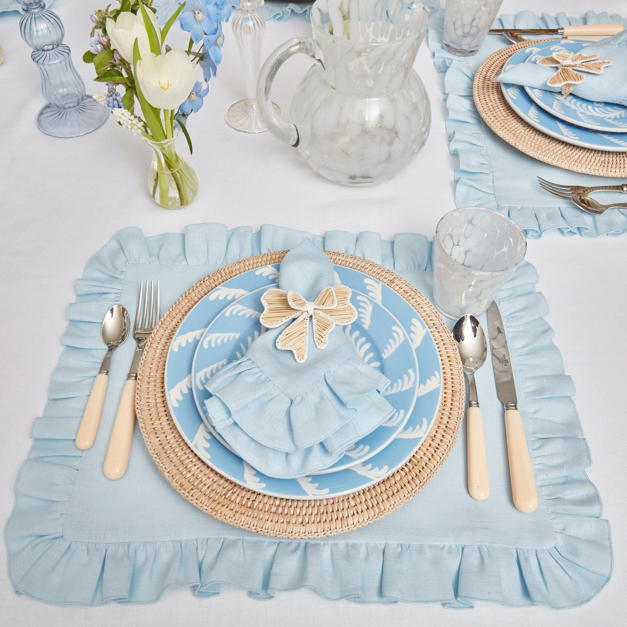 https://www.mrsalice.com/cdn/shop/files/sky-blue-ruffle-linen-placemats-set-of-4-mrs-alice-2_5774dbee-309b-46e1-91ad-b427d5d5c688.jpg?v=1689277704