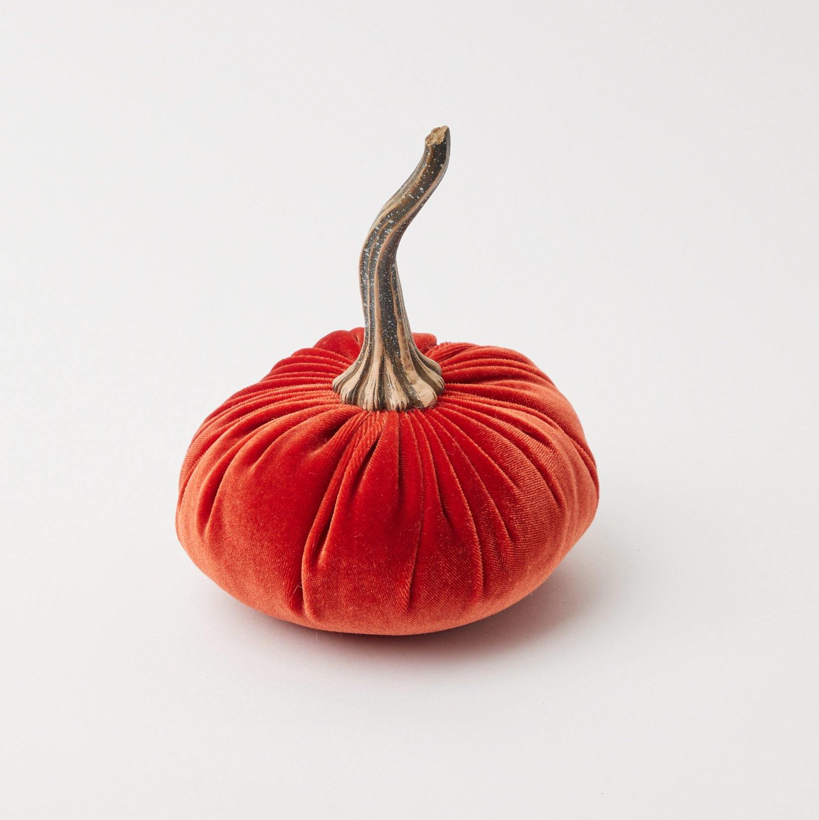 Trio of velvet pumpkins, portraying a family unit in varying sizes.