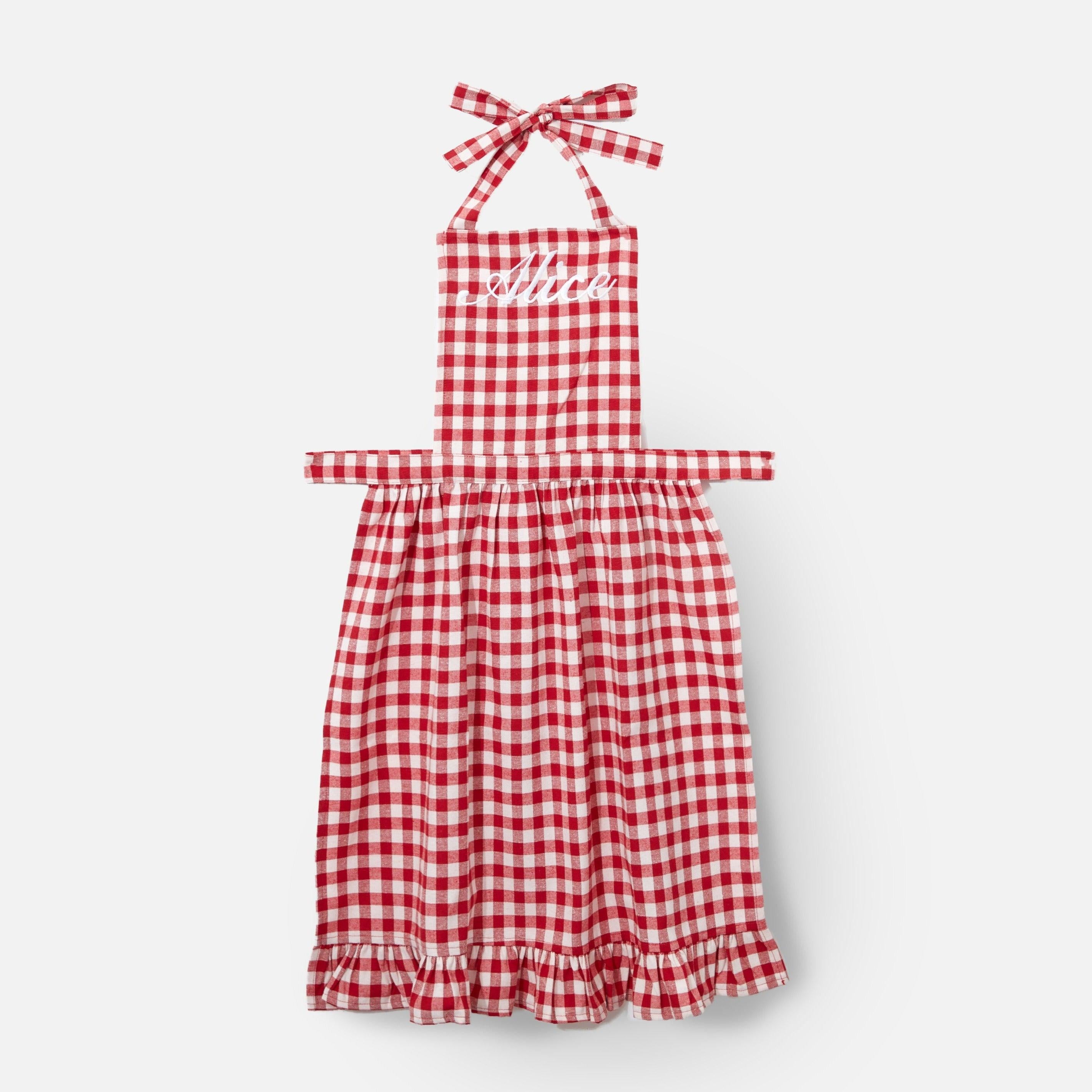 Add a touch of rustic elegance to your kitchen with the Swiss Red Frilled Gingham Apron - a classic choice for the modern homemaker.