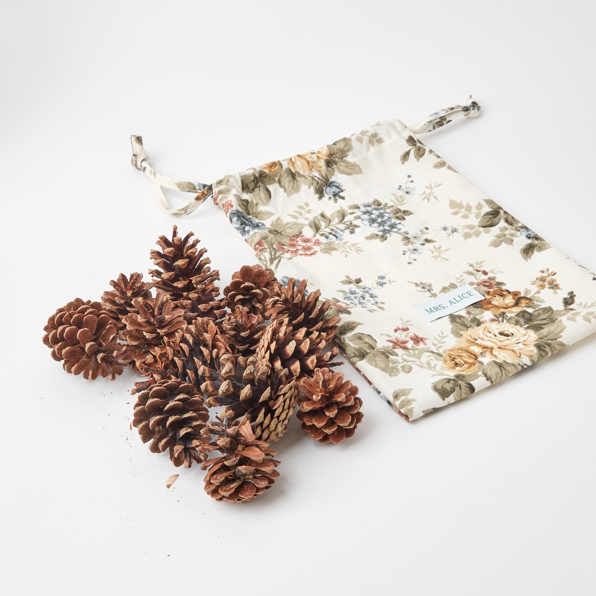 Refined decor choices by Mrs. Alice: Decorative Pinecones & Pochette.